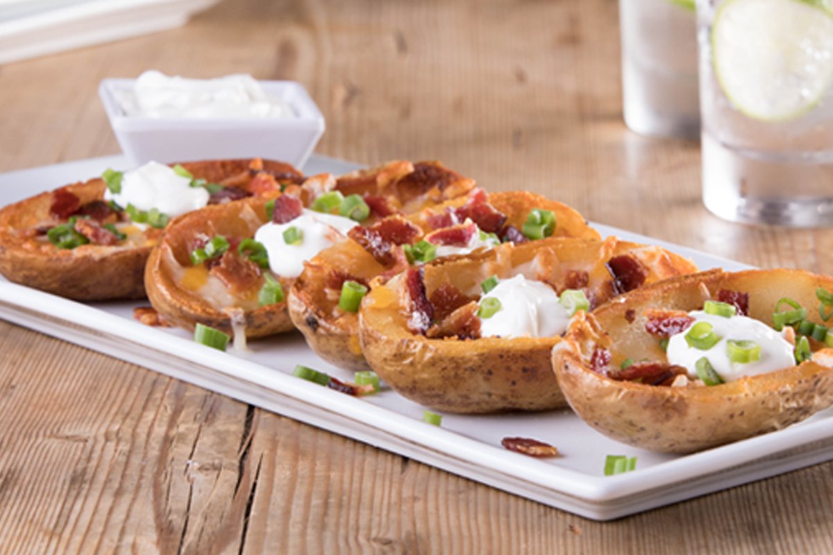 Order Potato Skins food online from American Grilled Cheese Company store, Wilmington on bringmethat.com