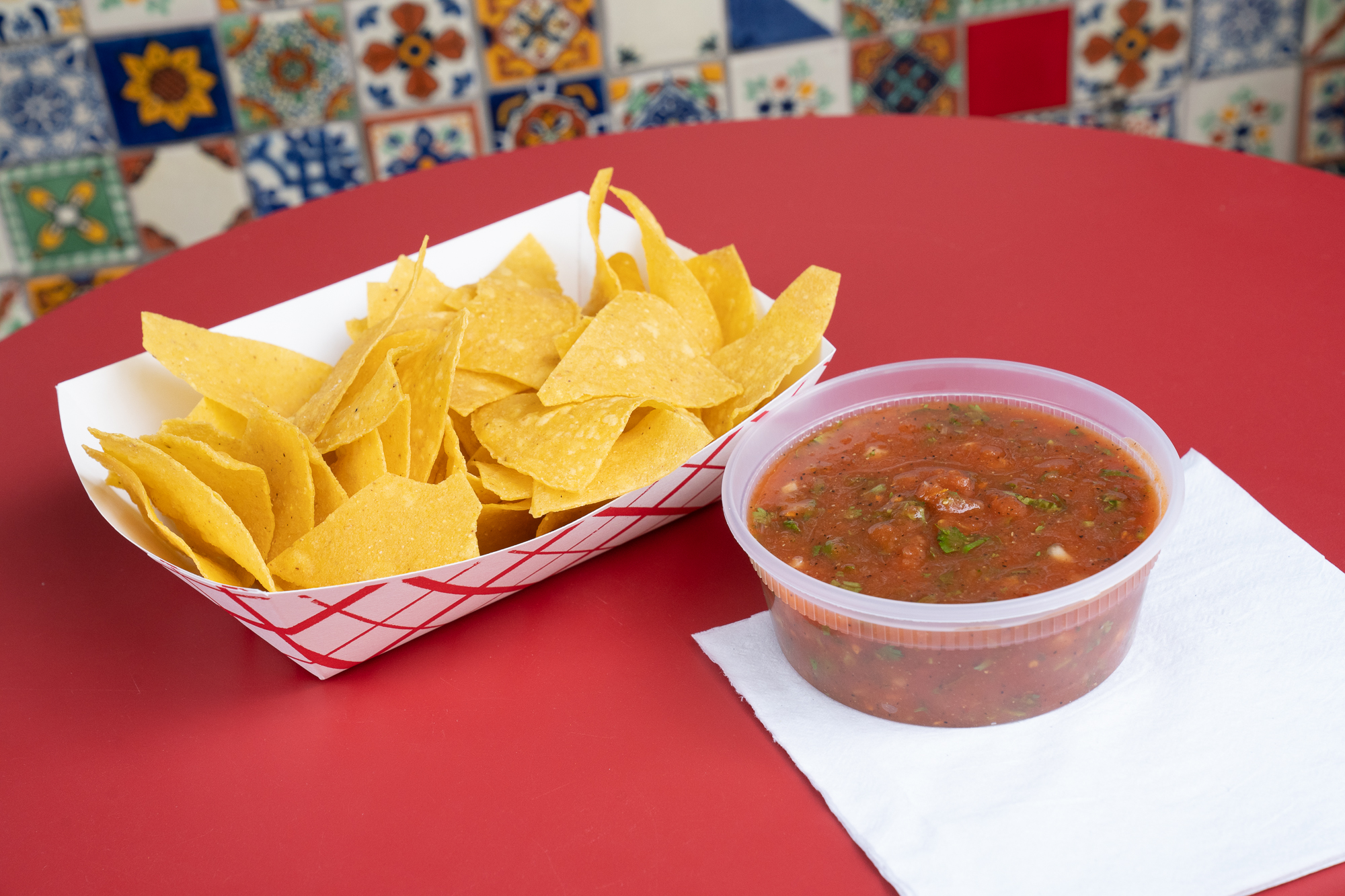 Order LARGE (8 oz) - House Made Chips and Salsa  food online from El barrio burritos store, Brooklyn on bringmethat.com
