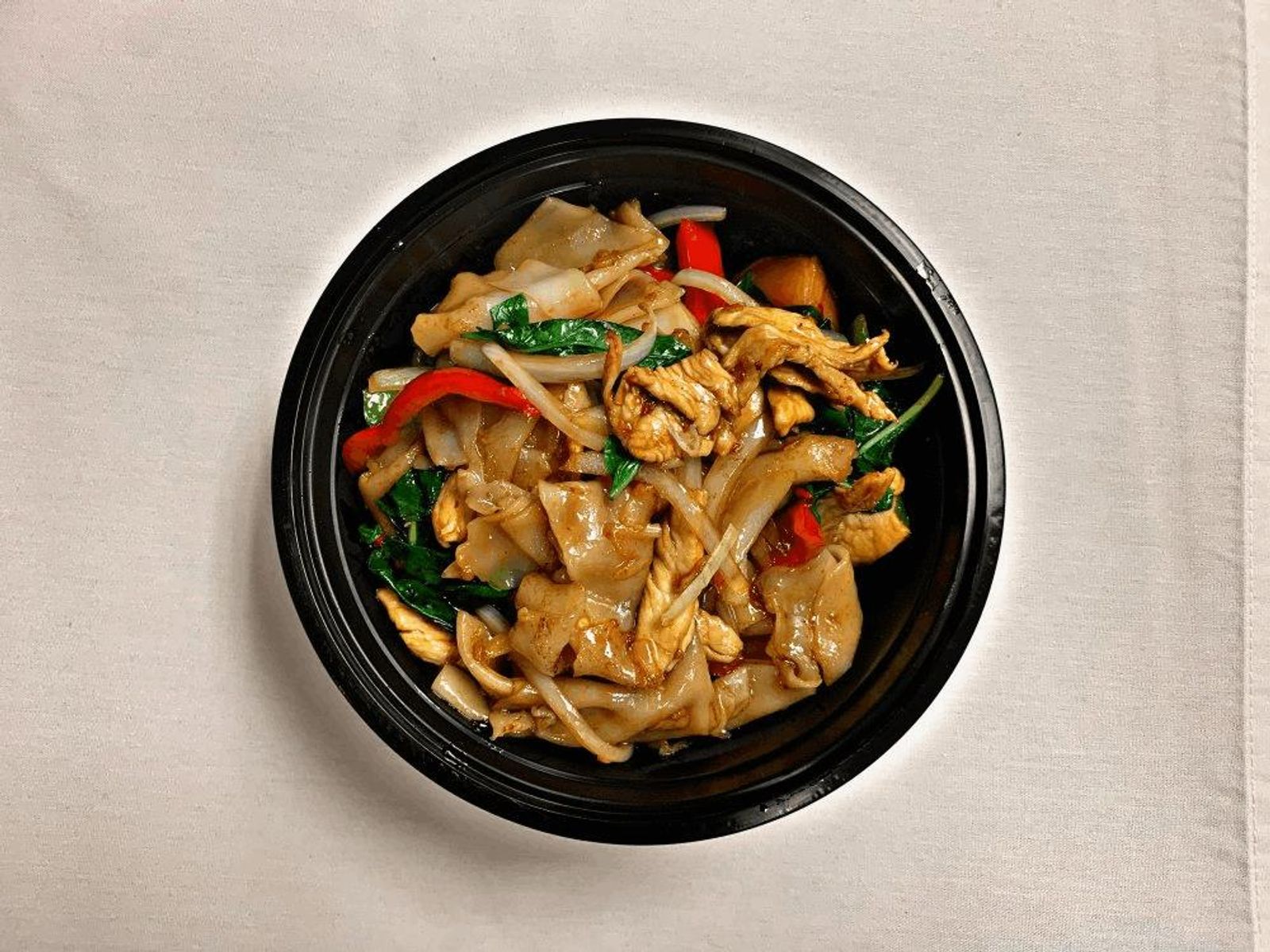Order N3 Pad Kee Mow (Drunken Noodle) food online from Thai Street Bistro store, Sacramento on bringmethat.com