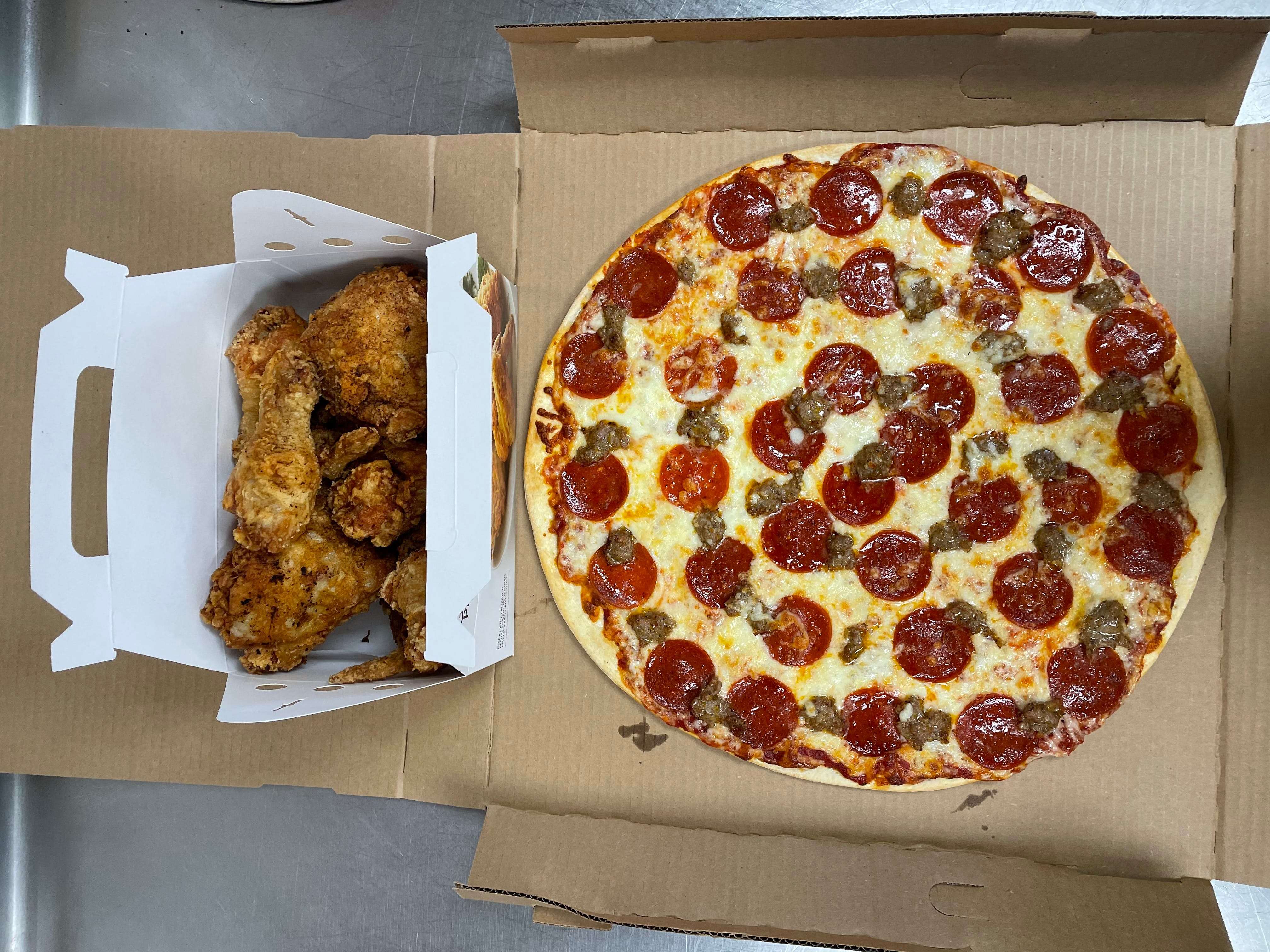 Order Pizza & Chicken Special - Special food online from Pizza Man store, Ellsworth on bringmethat.com