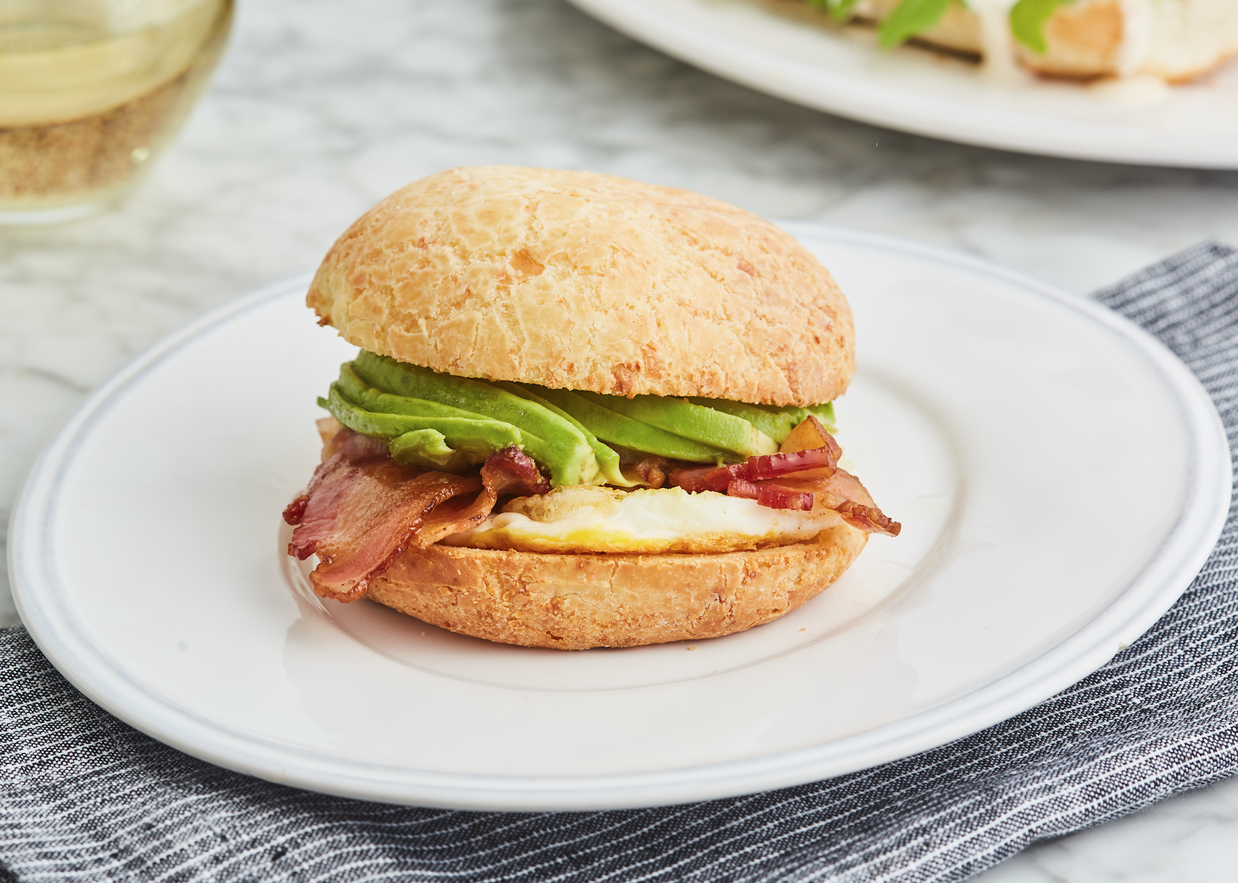 Order Fried Egg, Avocado, and Bacon food online from Cafe De Casa store, San Francisco on bringmethat.com
