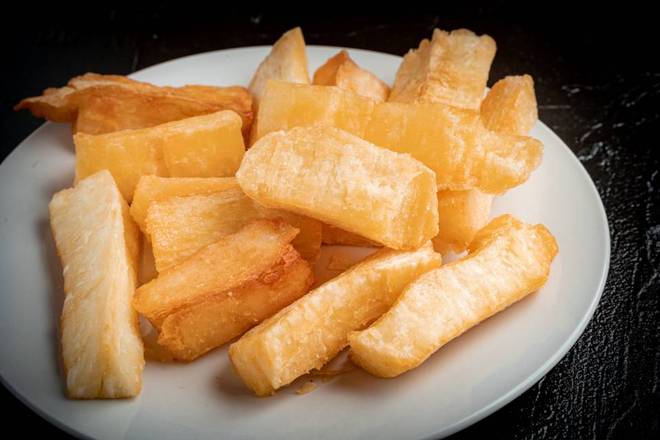 Order Large Fried Yuca food online from El Pollo Rico store, Silver Spring on bringmethat.com
