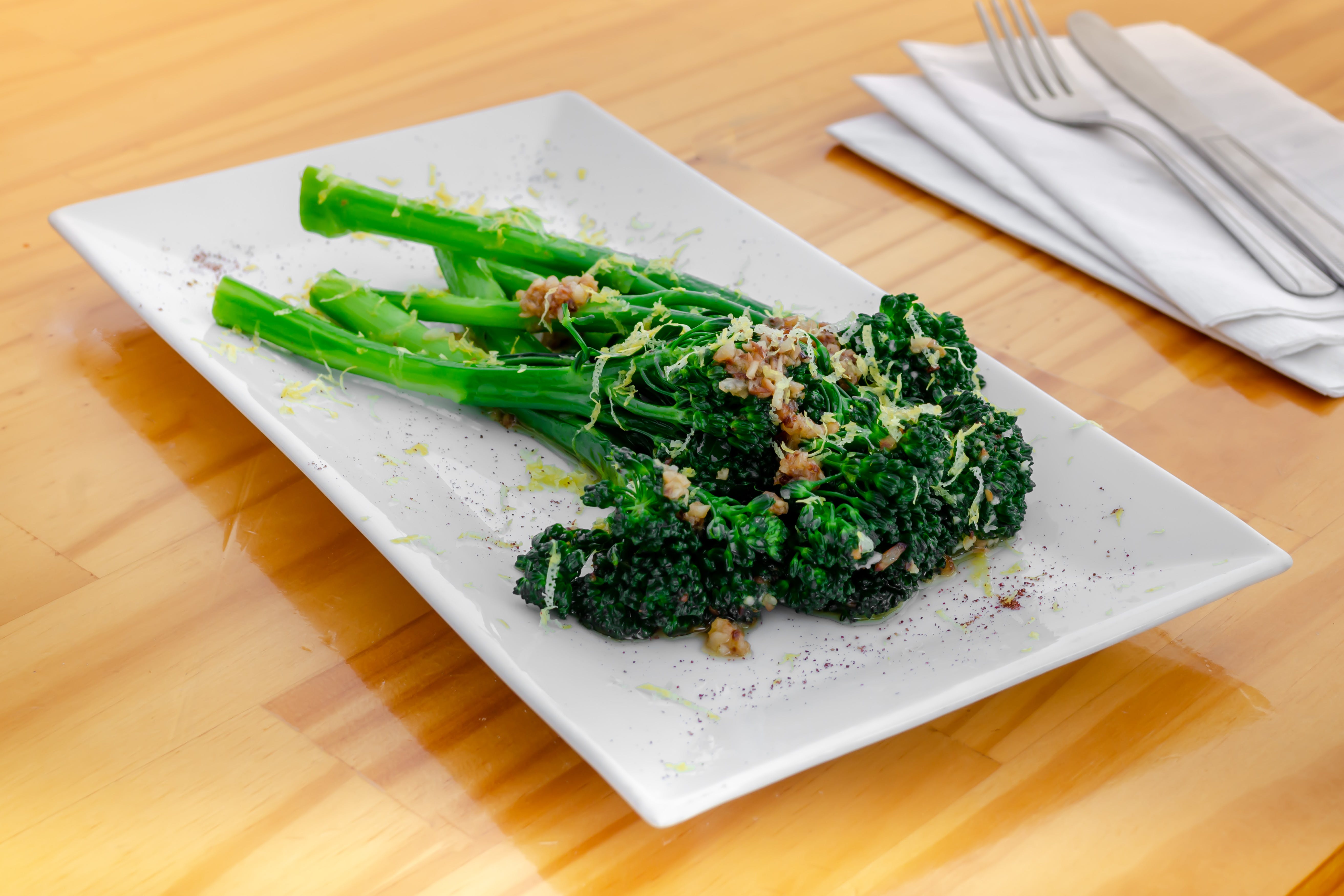 Order Broccolini - Sides food online from Urban Tomato store, Palisades Park on bringmethat.com
