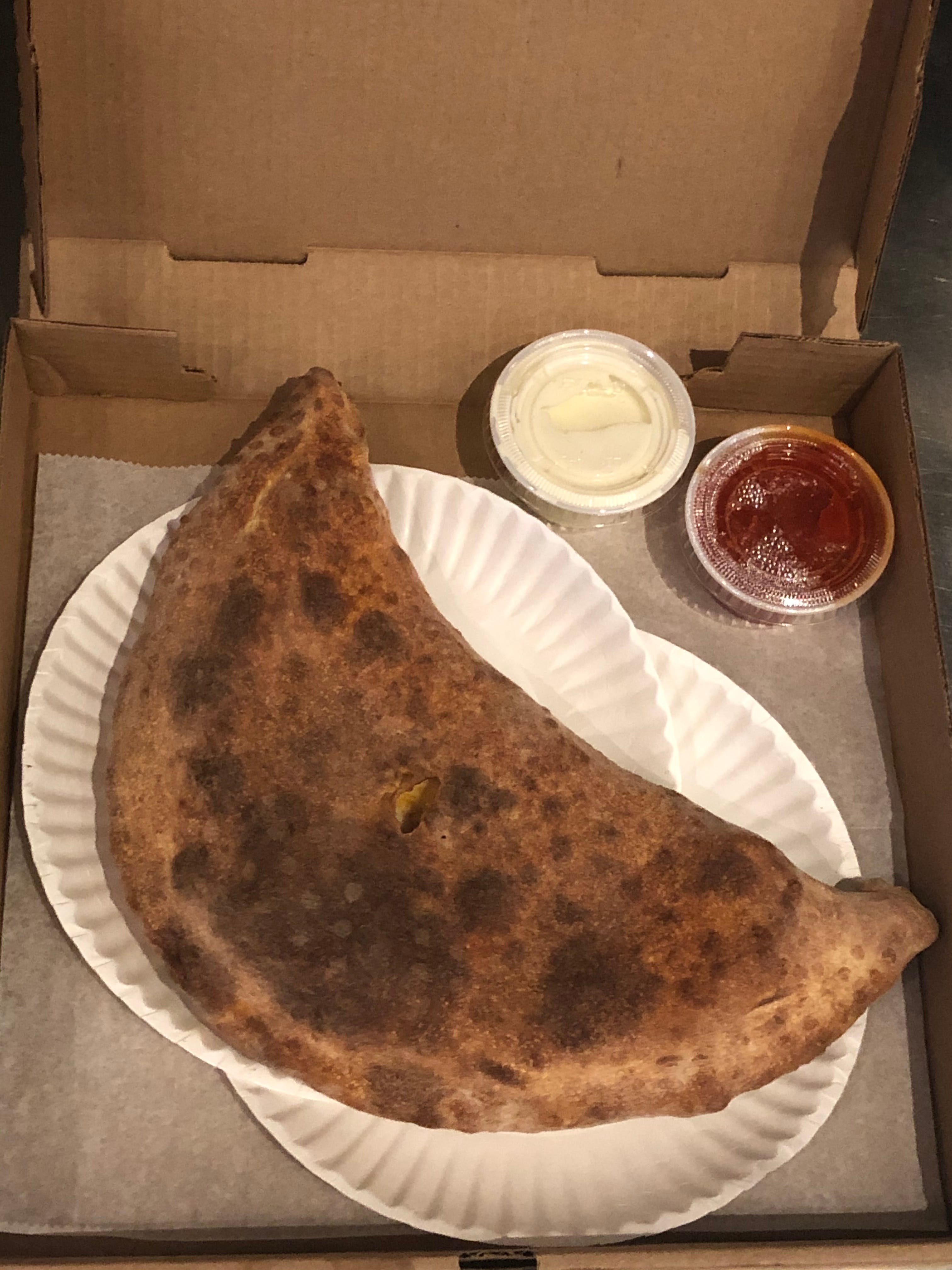 Order Buffalo Chicken Calzone - Calzone food online from Pizza Etc store, Brighton on bringmethat.com