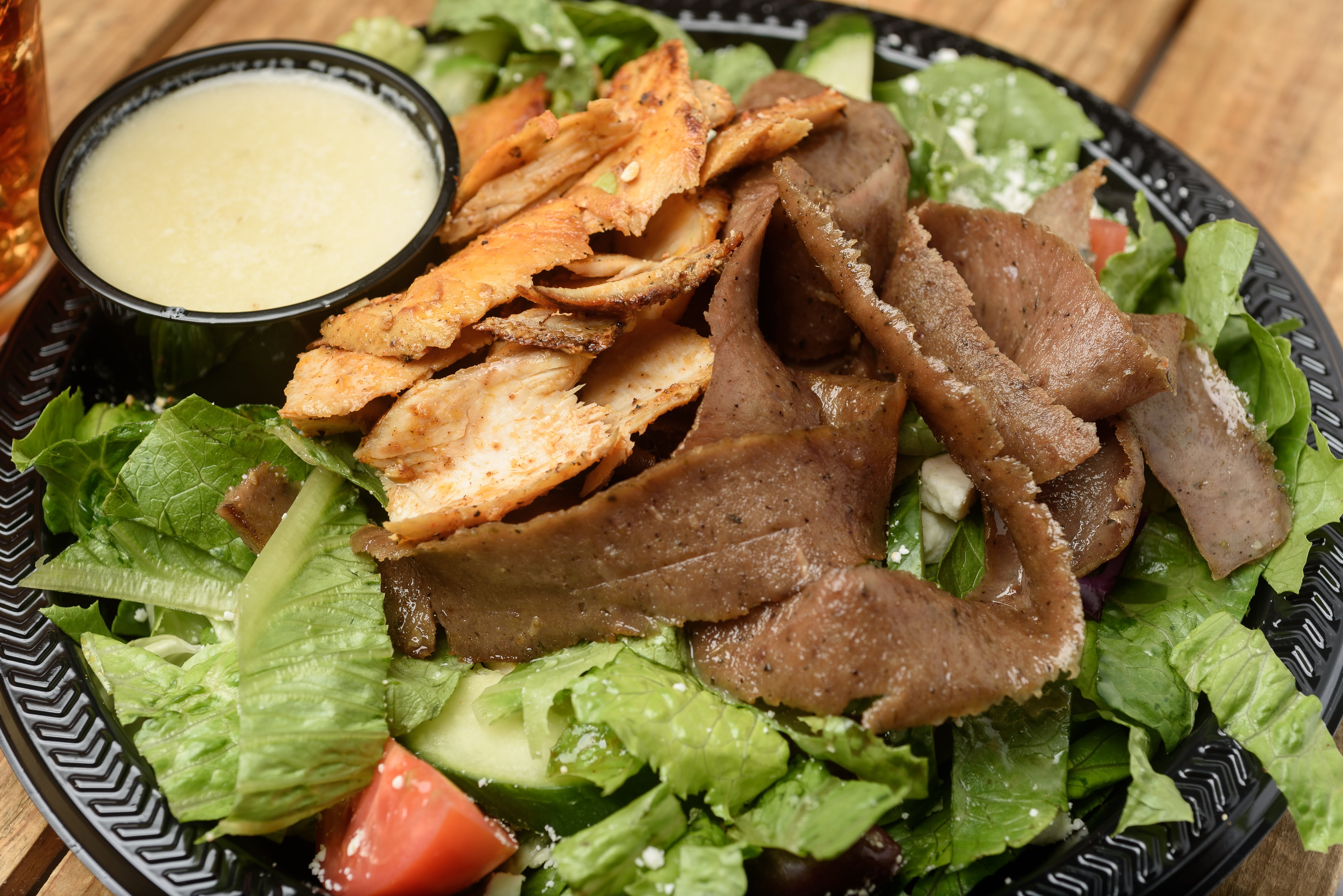 Order Creamy Feta Salad with Gyro & Chicken food online from Zorbas store, Youngsville on bringmethat.com