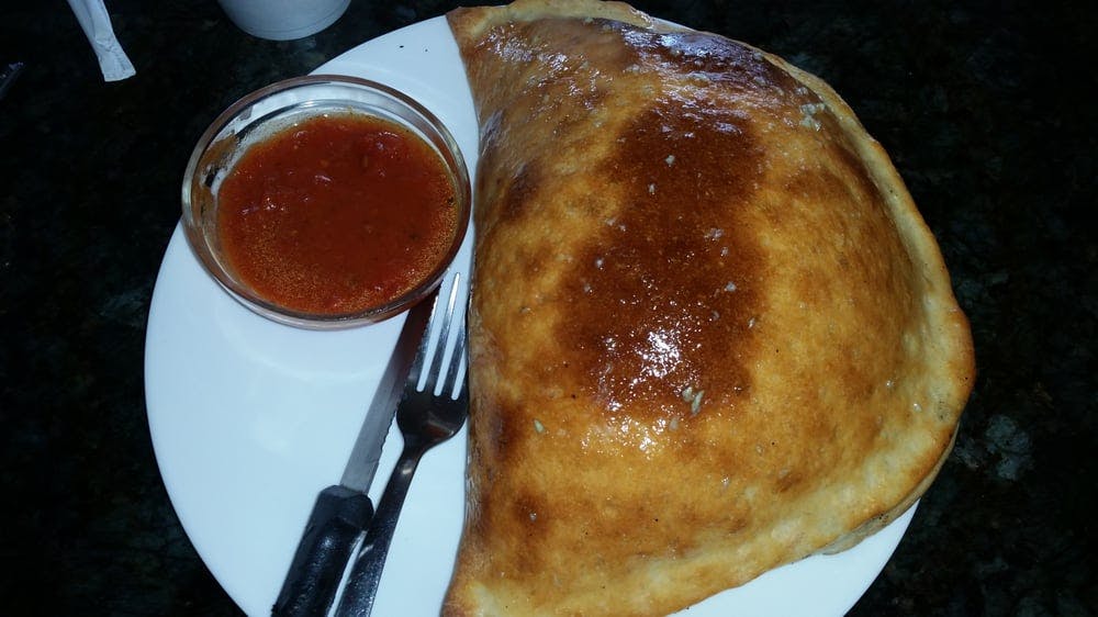 Order Traditional Calzone - Calzone food online from Pisa Pizza store, Fountain Hills on bringmethat.com