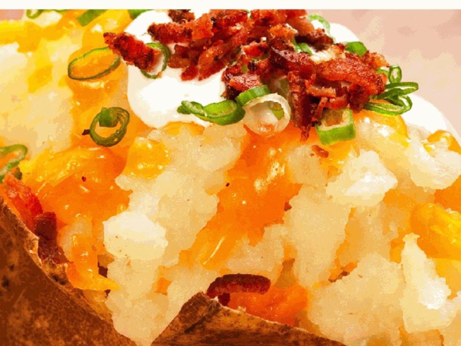 Order Signature Loaded Potato food online from Muscle Maker Grill store, New York on bringmethat.com