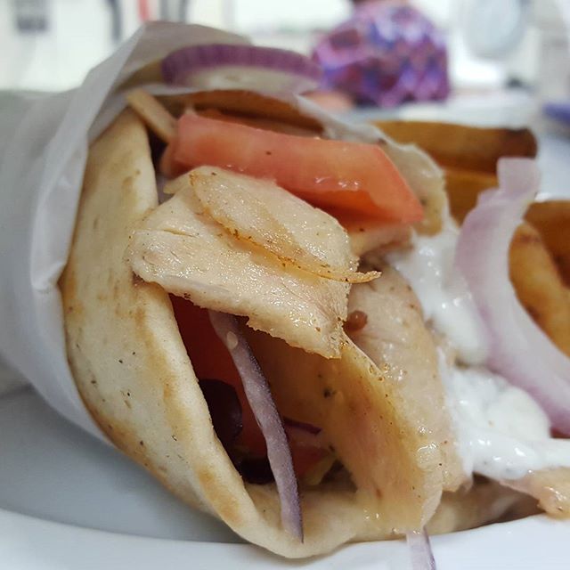 Order Chicken Gyro Sandwich food online from Atheneos Greek Village Cafe store, Mesquite on bringmethat.com