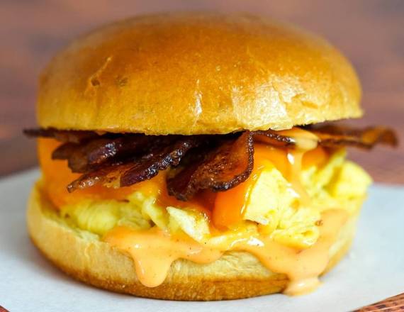 Order Brioche, Bacon, Egg & Cheddar Breakfast Sandwich food online from All About Breakfast store, Concord on bringmethat.com