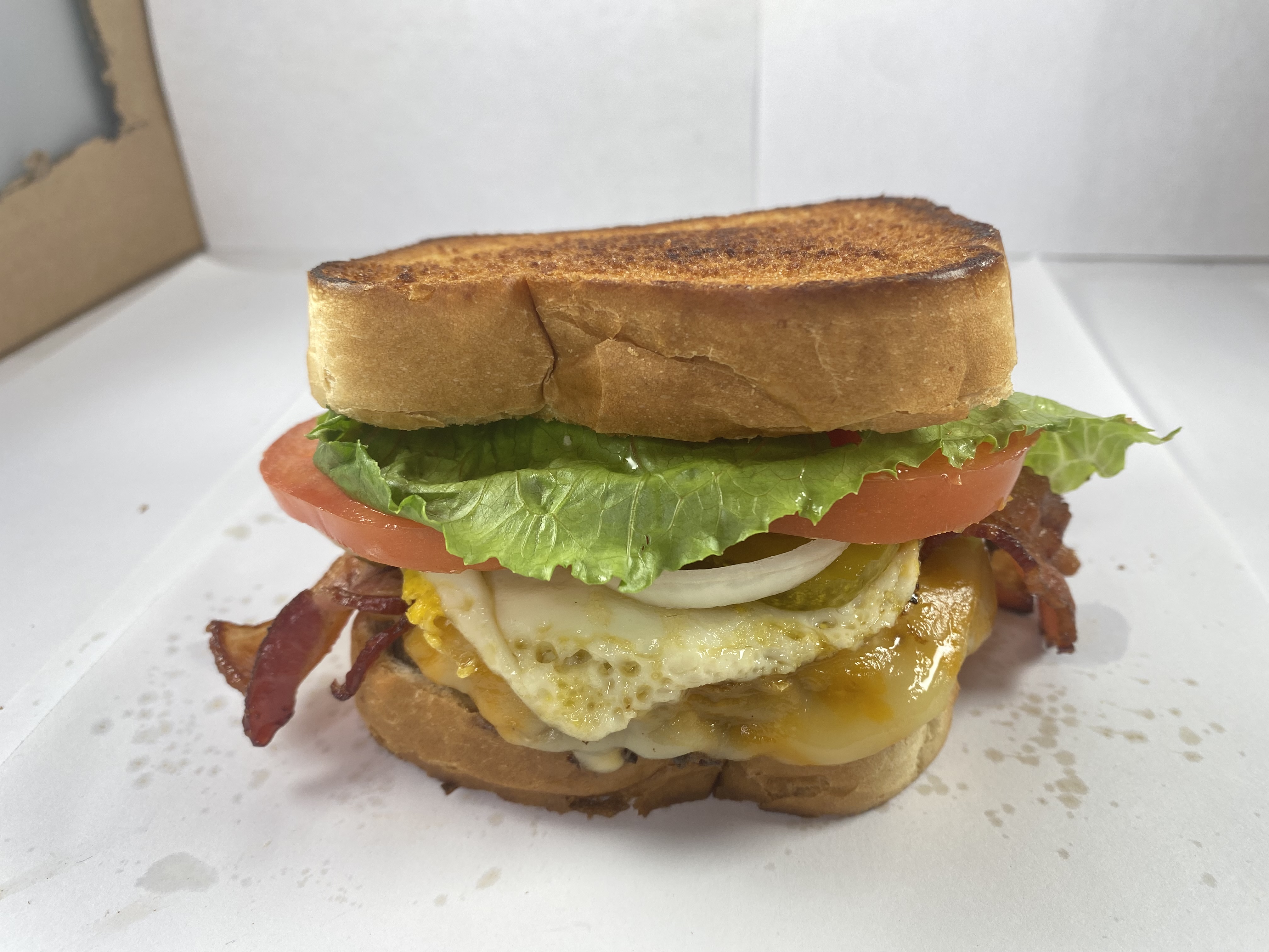 Order Hangover Grilled Sandwich PM food online from Sizzling Shots store, Hapeville on bringmethat.com