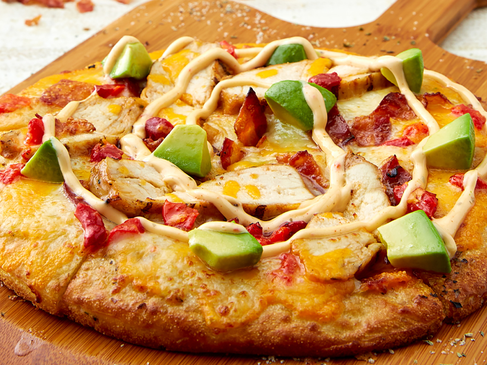Order California Chicken & Avocado Pizza food online from Schlotzsky store, Houston on bringmethat.com