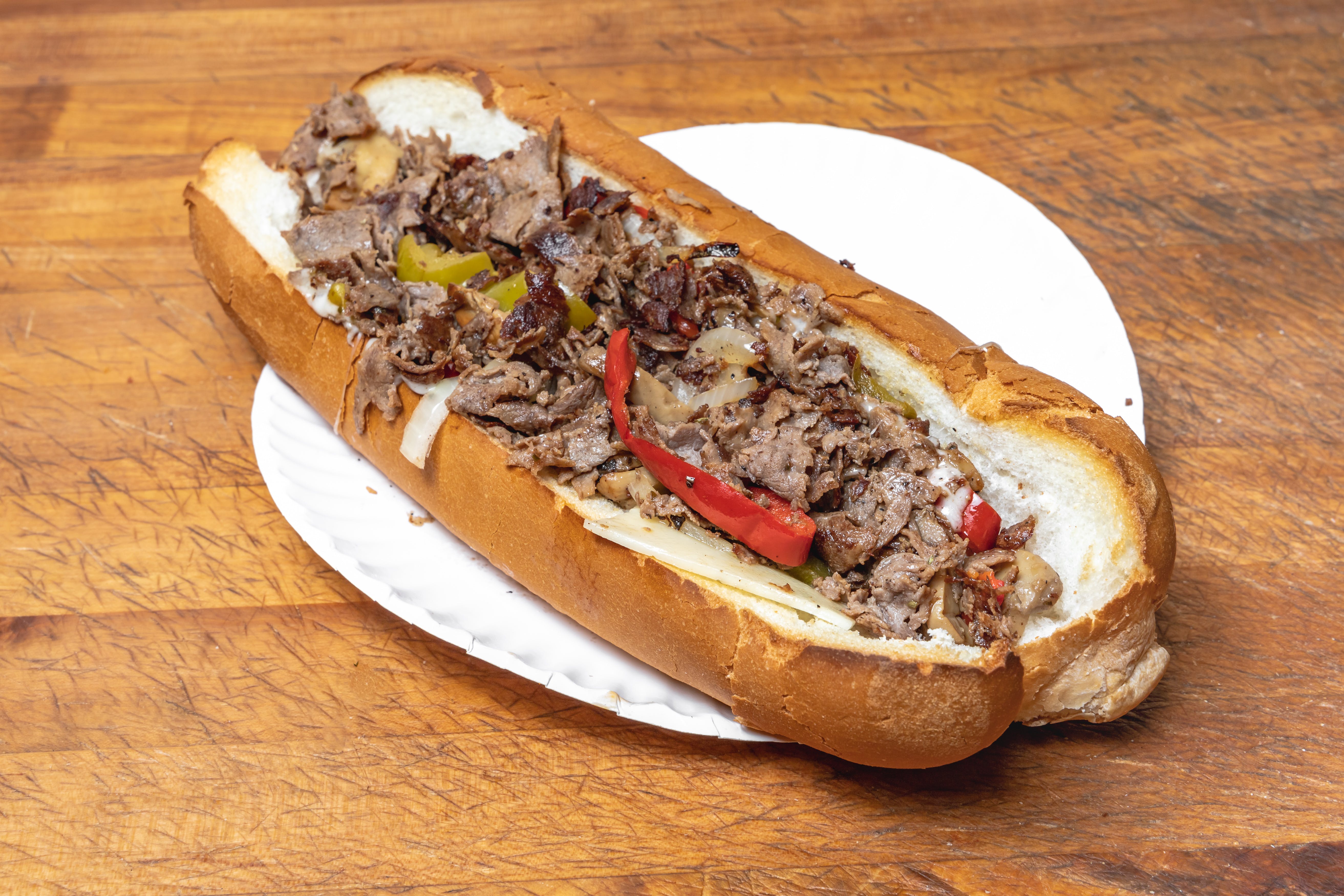 Order Steak Bomb Sub - Small 8" food online from Garden Pizza store, Milford on bringmethat.com