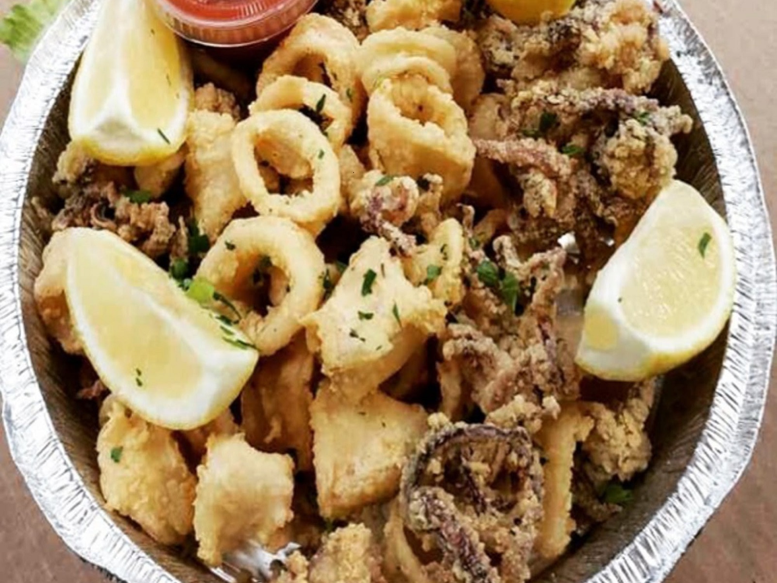 Order Fried Calamari Small food online from Annetti's Pizzeria store, Norridge on bringmethat.com