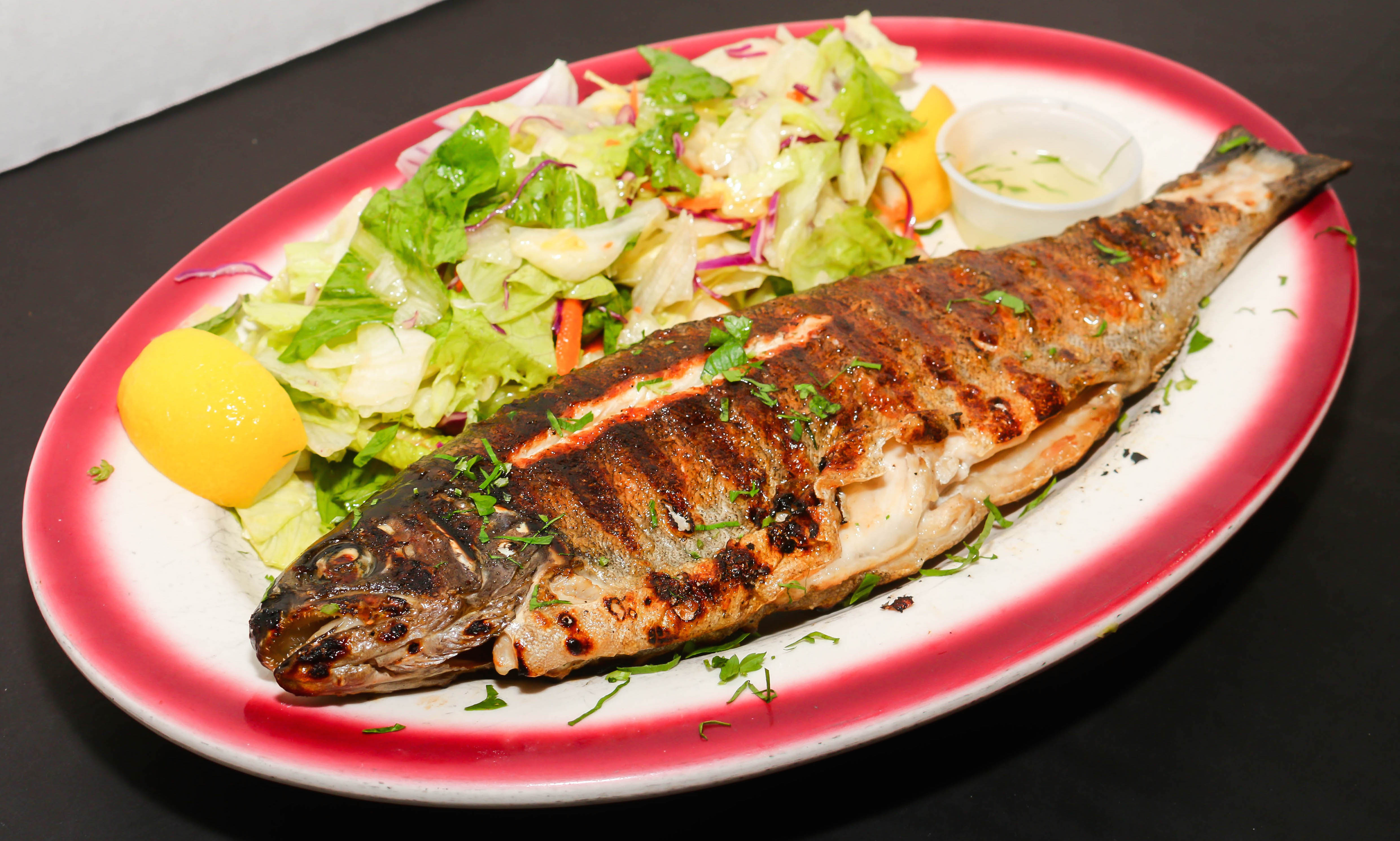 Order Grilled Trout food online from Taci's Beyti store, Brooklyn on bringmethat.com