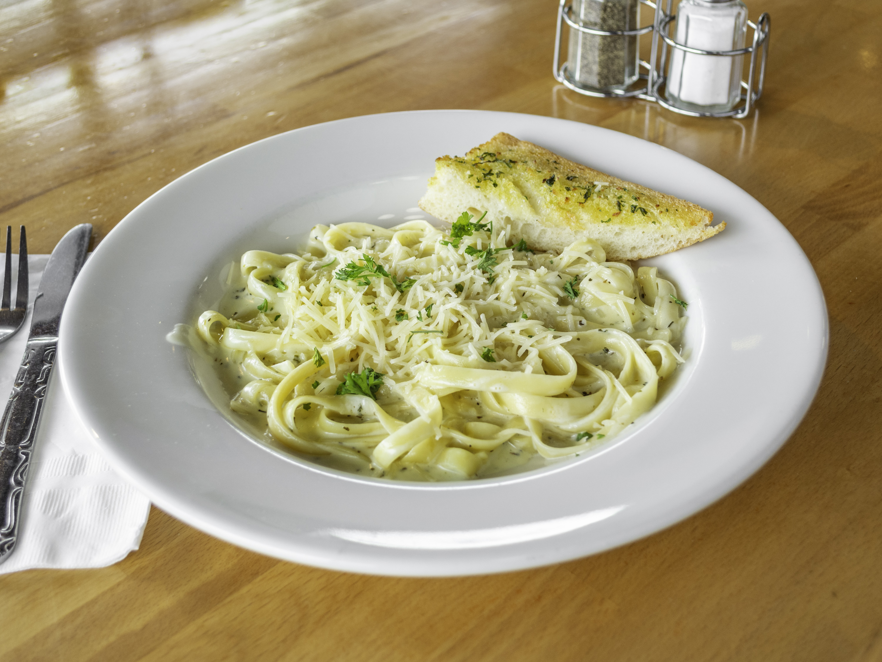 Order Fettuccine Alfredo food online from Romio's Pizza store, King County on bringmethat.com