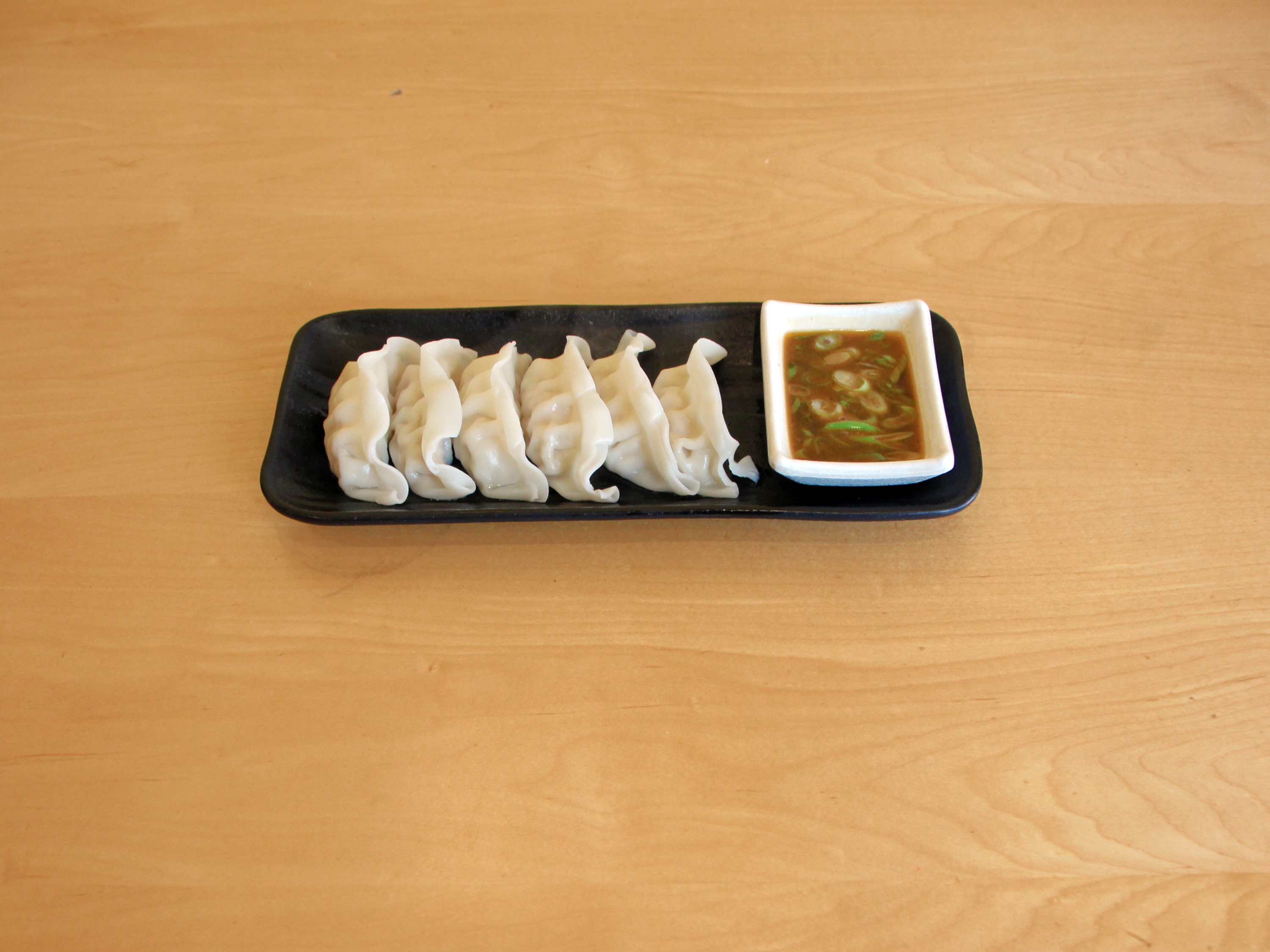 Order 6 Piece Chinese Dumplings food online from Zencha Tea Salon store, Columbus on bringmethat.com