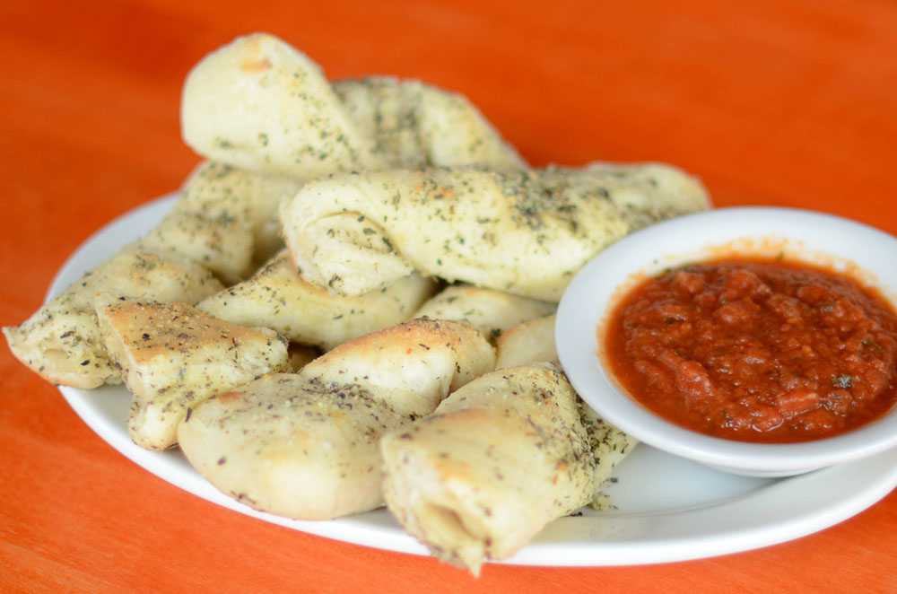 Order Herbed Breadsticks food online from The Roman Candle Pizzeria store, Middleton on bringmethat.com