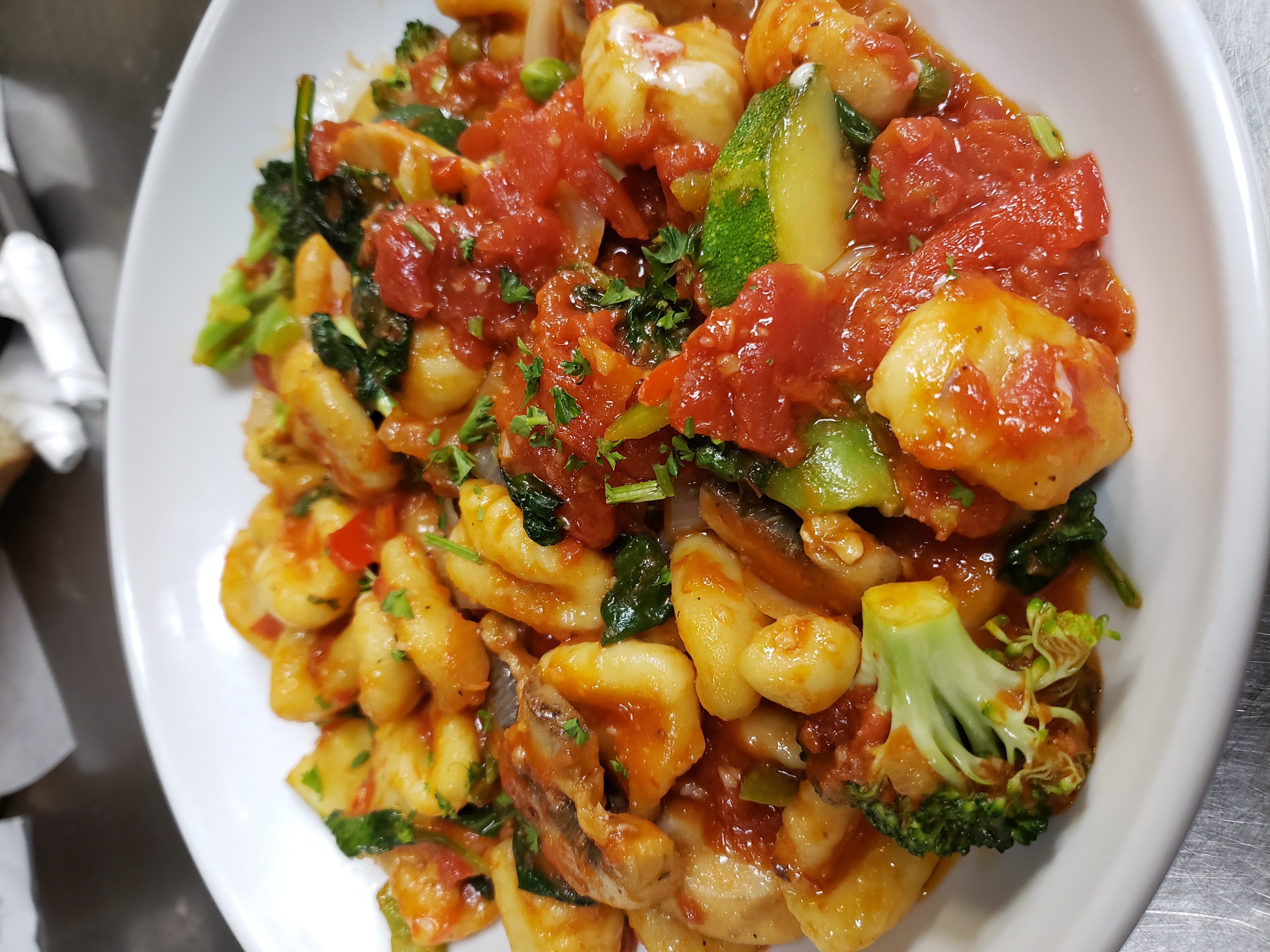 Order Veggie Gnocchi food online from Amiccis store, Baltimore on bringmethat.com