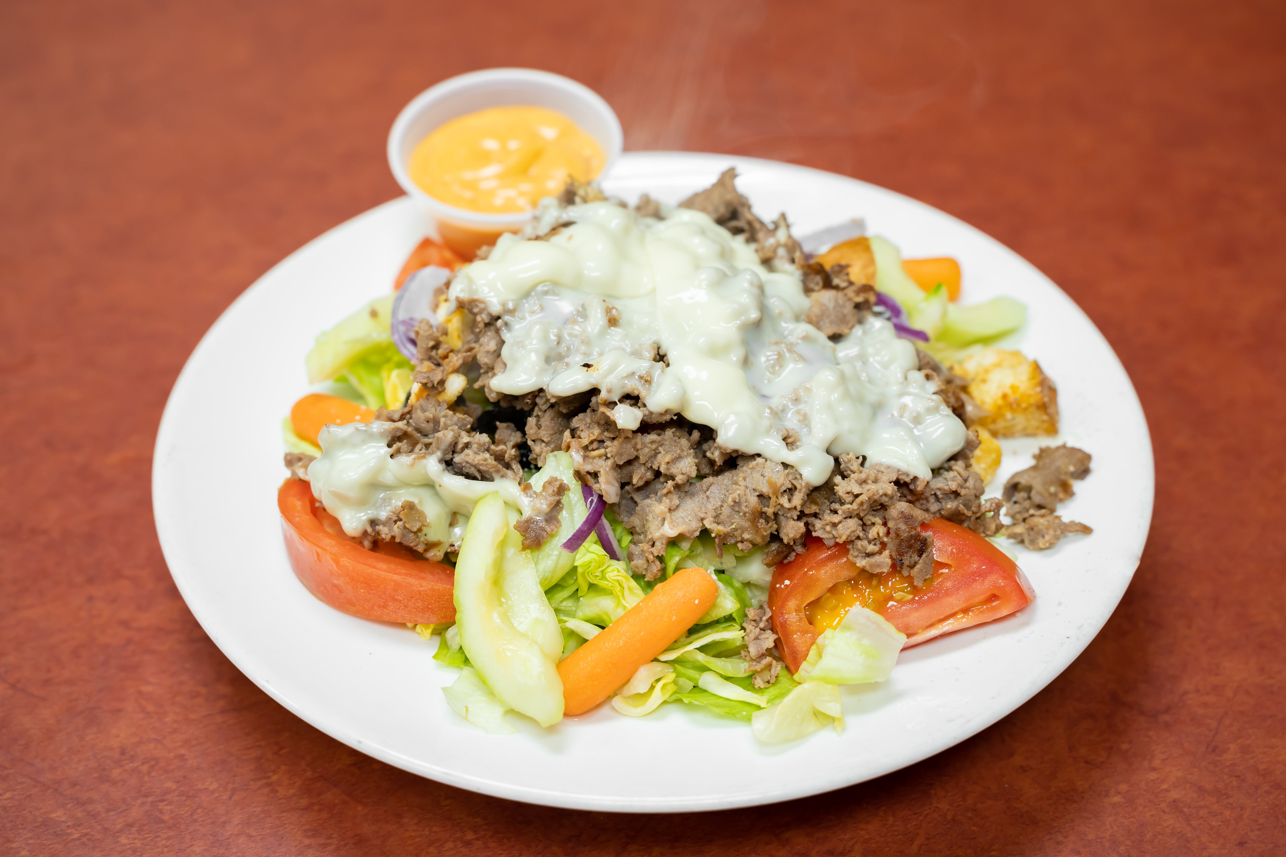 Order Cheesesteak Salad - Small food online from Tony Sopranos Pizza store, Cherry Hill on bringmethat.com
