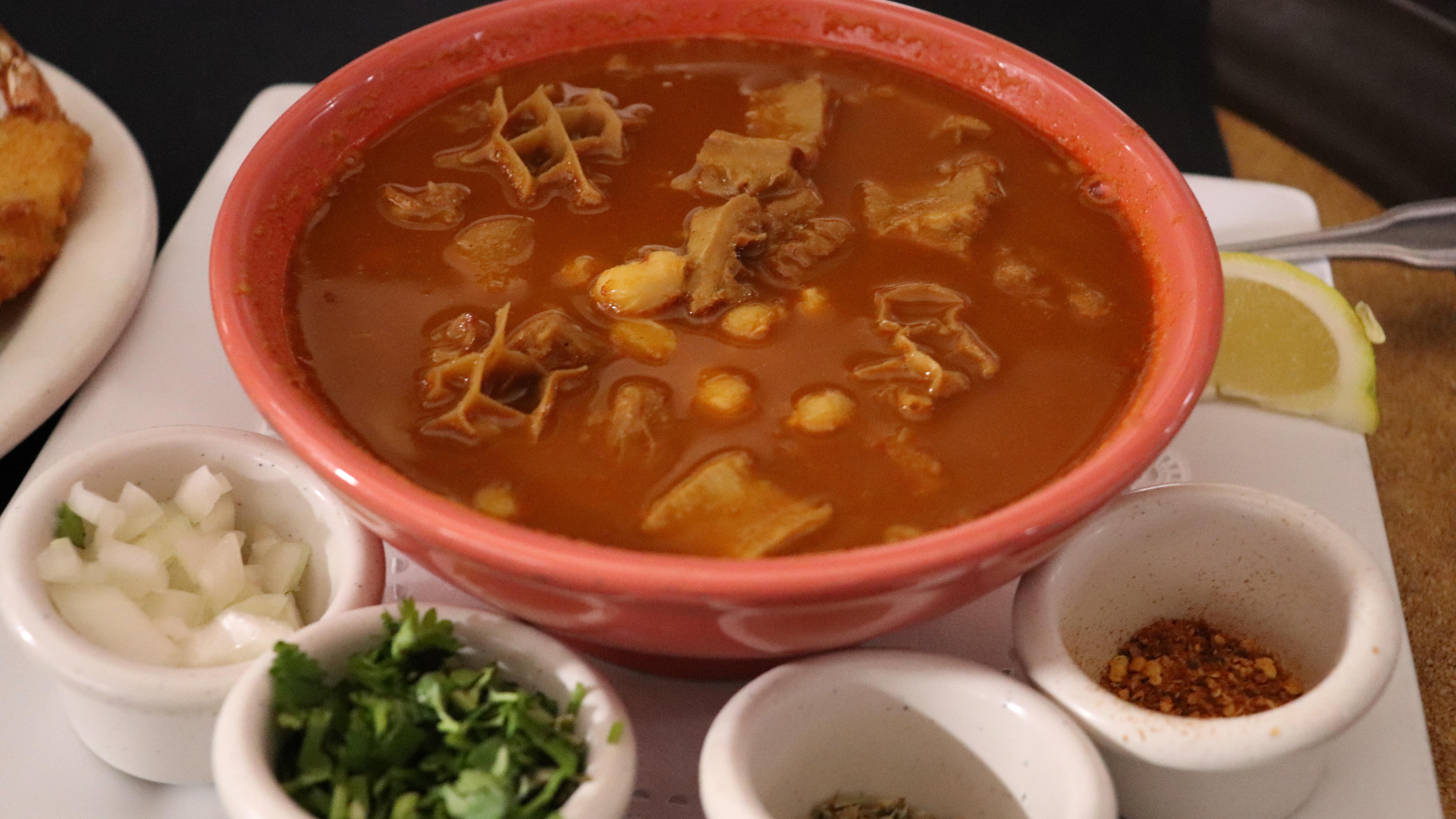 Order Menudo food online from Iguana Grill & Cantina store, Bakersfield on bringmethat.com