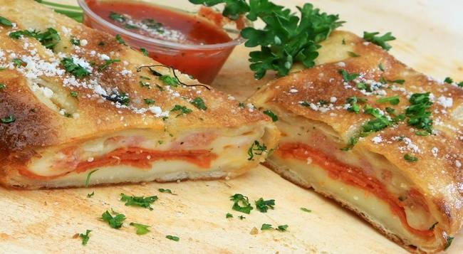 Order Pepperoni Stromboli food online from Sicilian Delight store, Ithaca on bringmethat.com