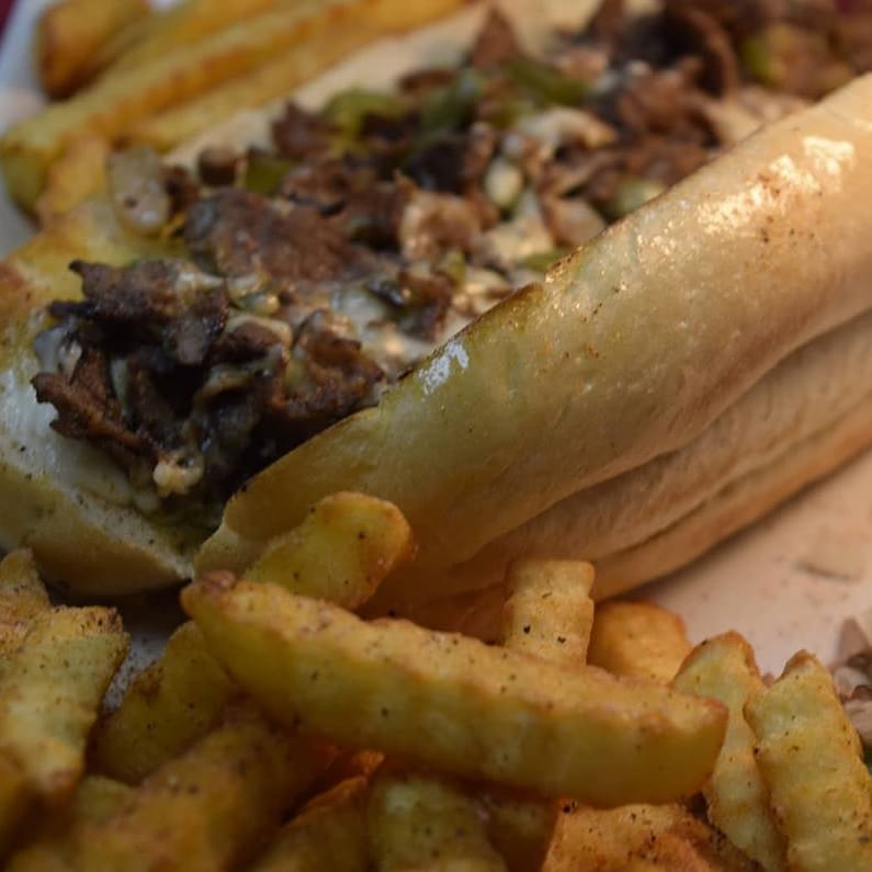 Order Philly Cheese Steak Sandwich food online from Burgers N Beyond store, Fort Worth on bringmethat.com