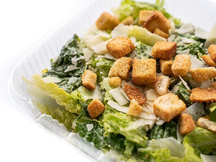 Order Classic Caesar Salad - Half food online from Chicho's Pizza store, Chesapeake on bringmethat.com