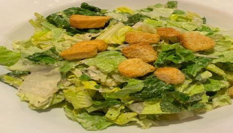 Order Caesar Salad food online from Tilted Kilt store, Prince George on bringmethat.com