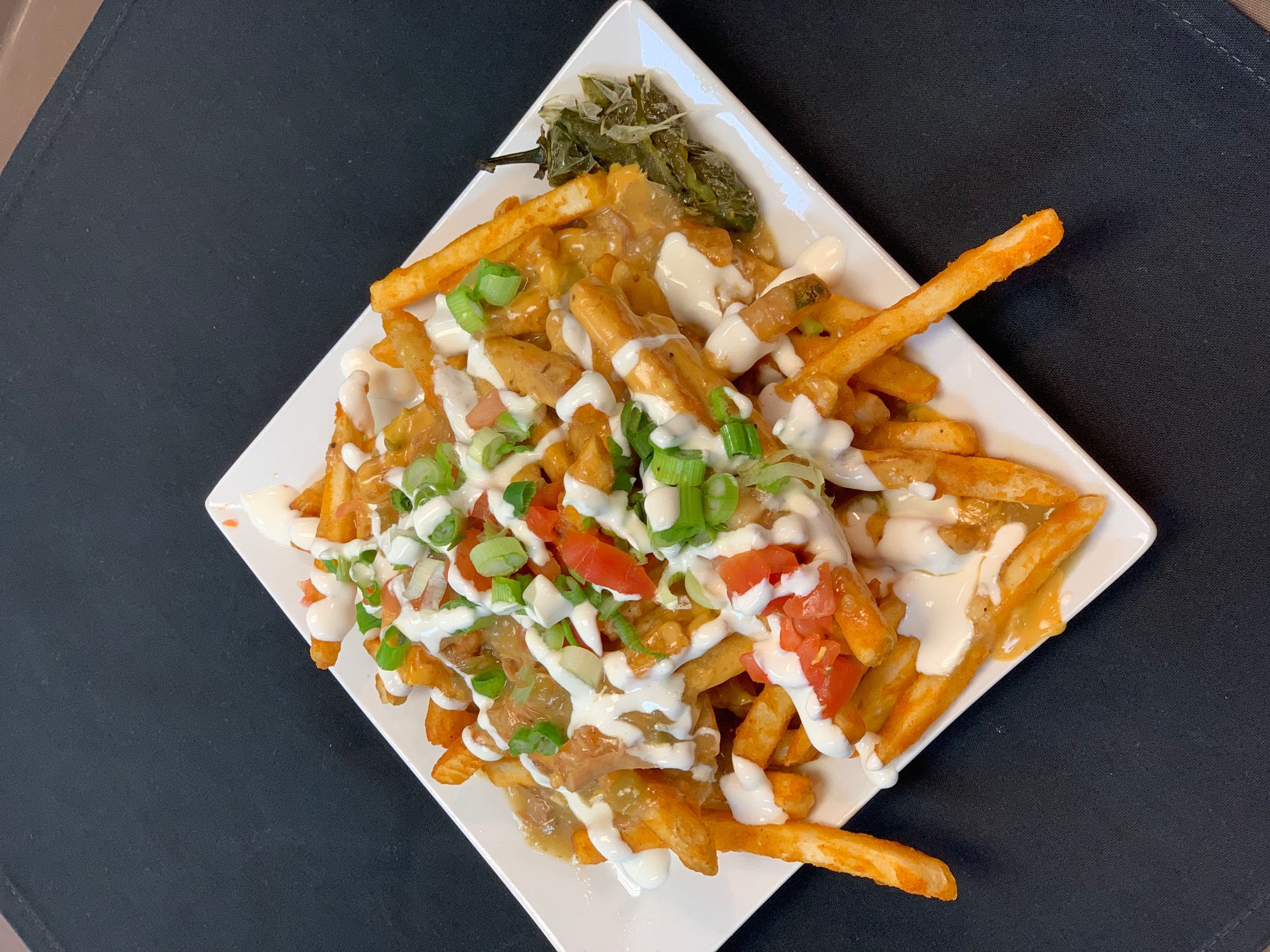Order Chile Cheese Fries food online from 2 Penguins Tap And Grill store, Centennial on bringmethat.com