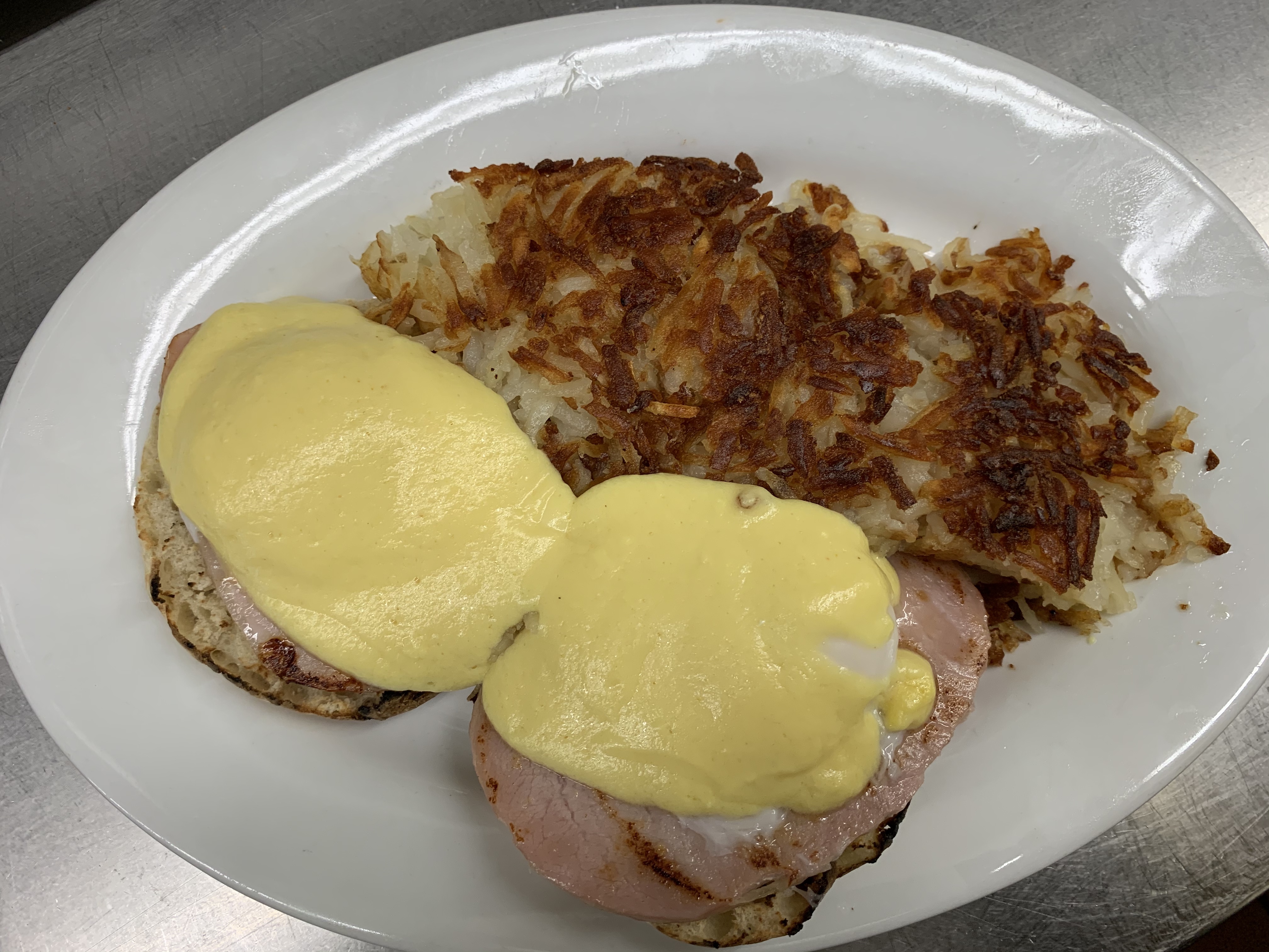 Order Classic Egg Benedict food online from Mark Twain Diner Restaurant store, Union on bringmethat.com