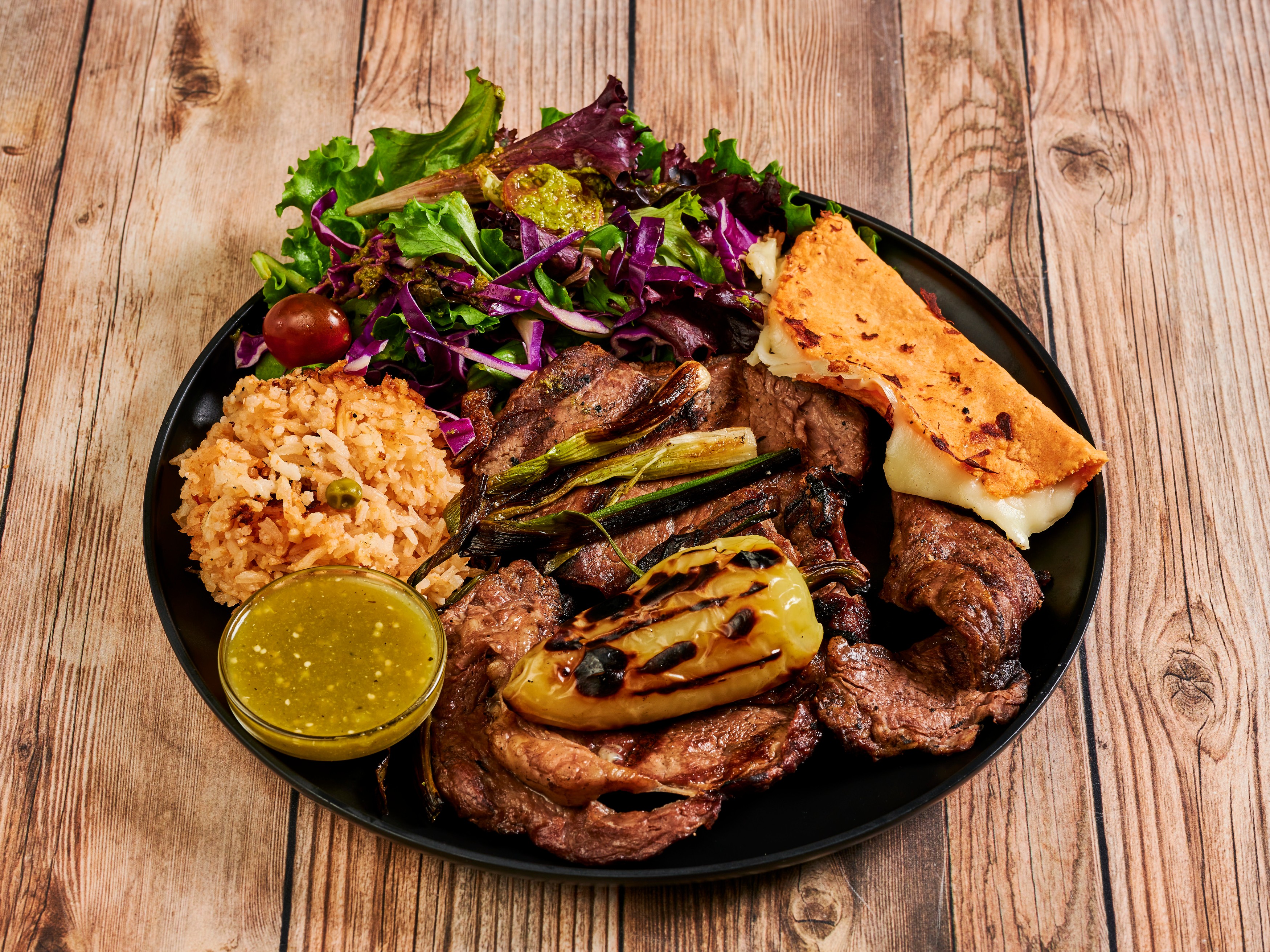 Order Carne Asada food online from Los yaquis store, San Francisco on bringmethat.com
