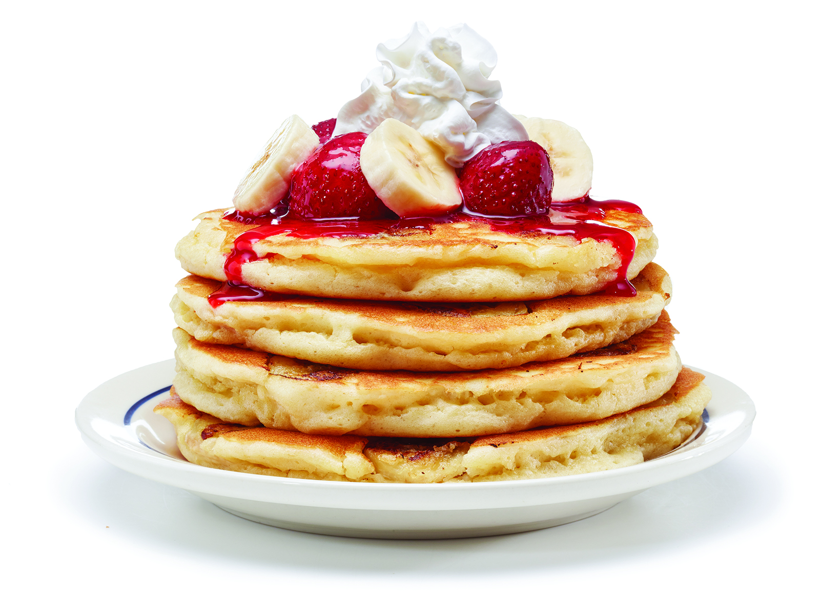 Order Strawberry Banana Pancakes  food online from IHOP store, Rochester on bringmethat.com