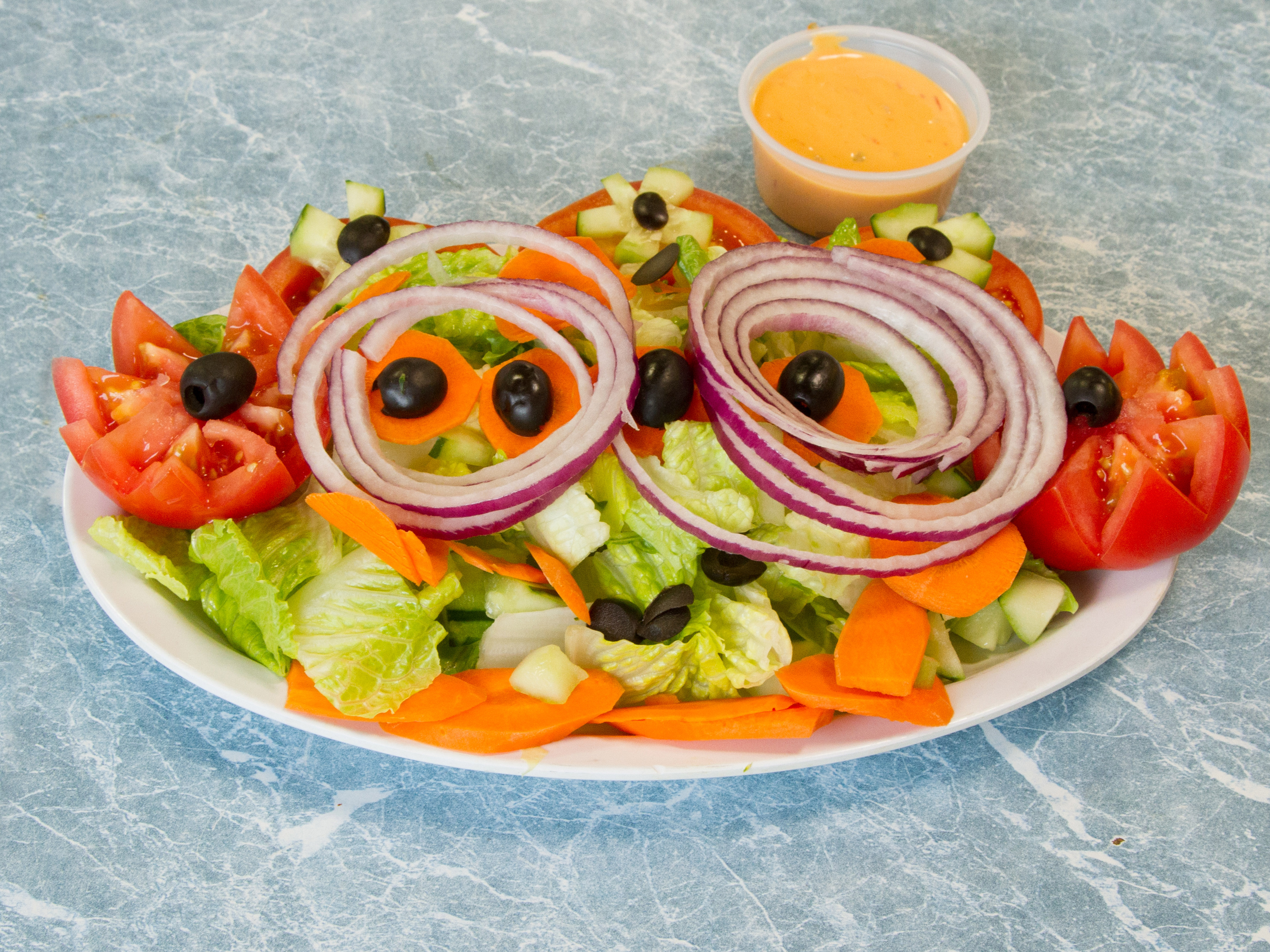 Order Garden Salad food online from Carusos Pizza store, Lynn on bringmethat.com