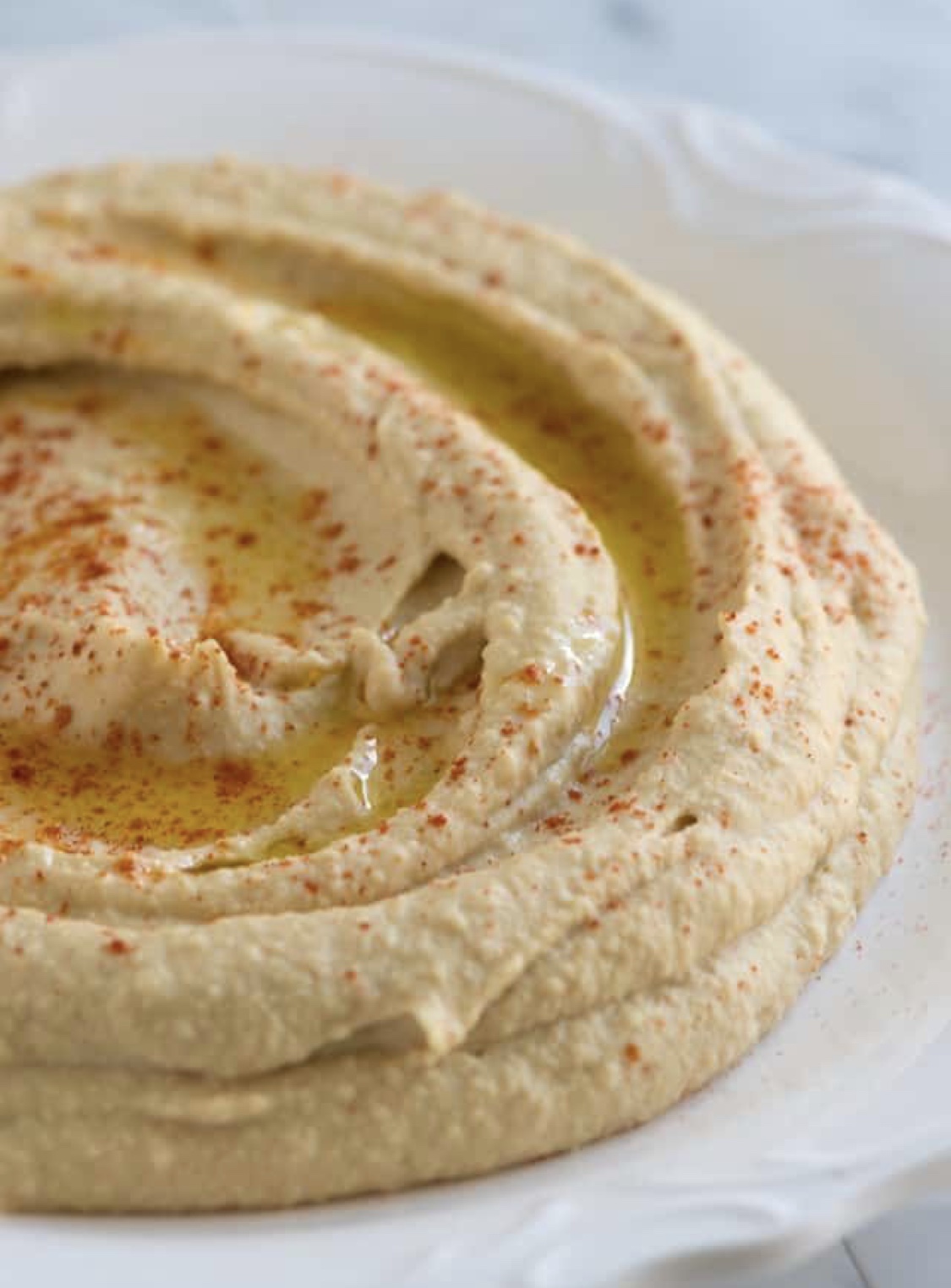 Order Our Signature Hummus food online from District North store, Columbus on bringmethat.com
