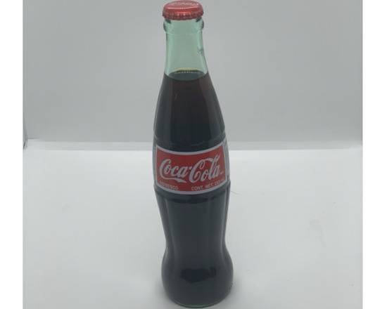 Order Coca Cola food online from Dtown Pizzeria store, West Hollywood on bringmethat.com