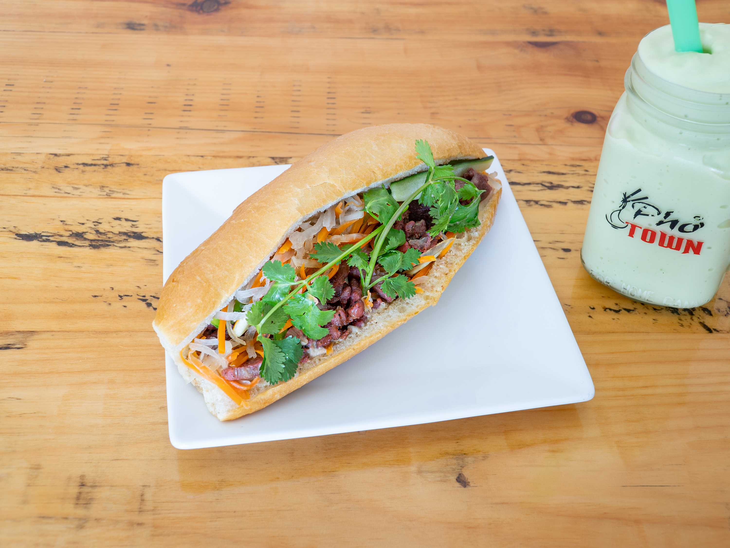 Order Vietnamese Baguette Sandwich with Pork Slices BBQ food online from Pho Town store, McDonough on bringmethat.com
