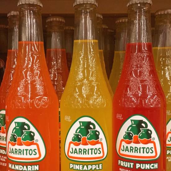 Order Jarritos - 12 oz Bottle food online from Cantina Los Amigos store, Grand Rapids on bringmethat.com