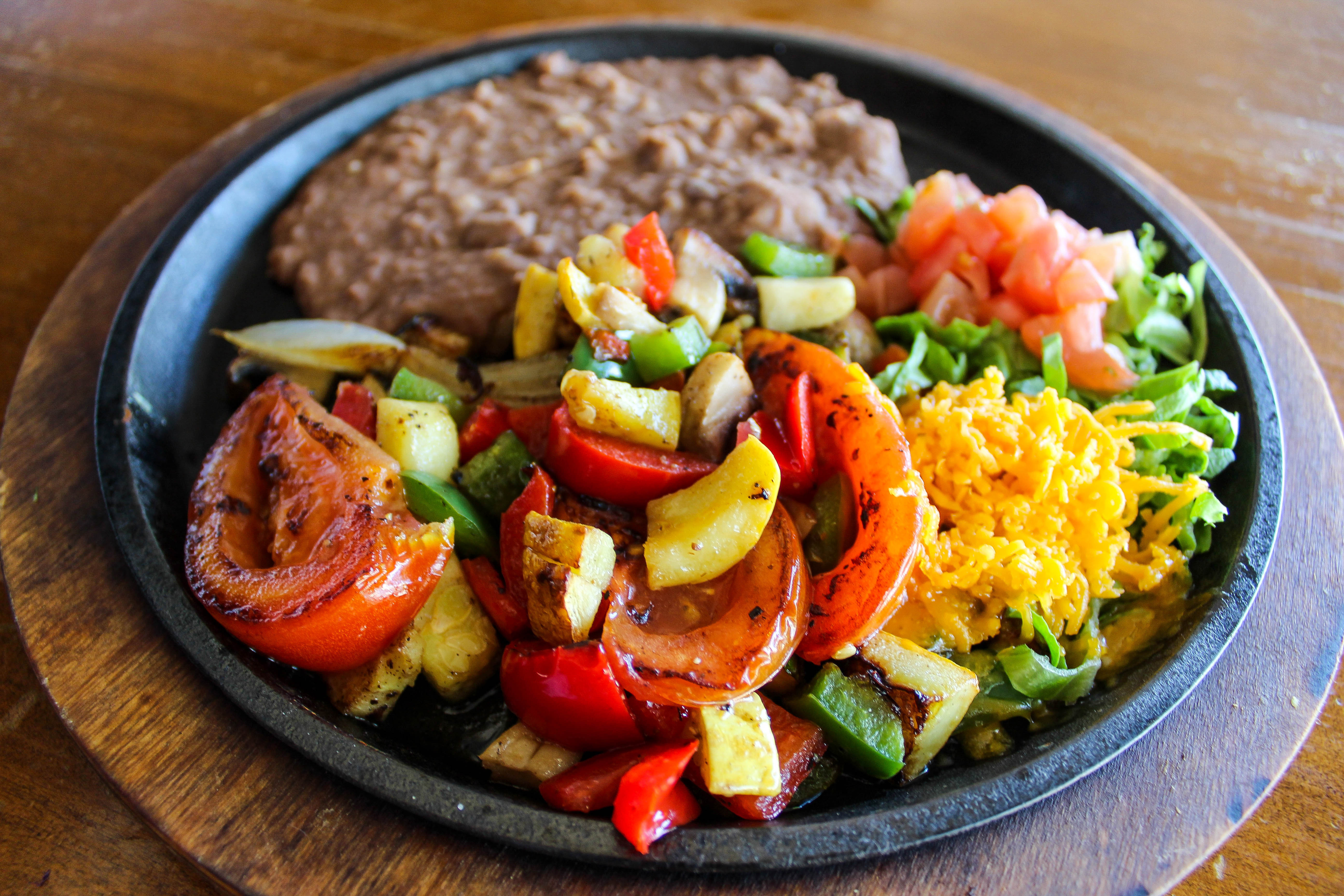 Order Veggie Fajitas food online from Las Palomas Restaurant & Bar store, Austin on bringmethat.com