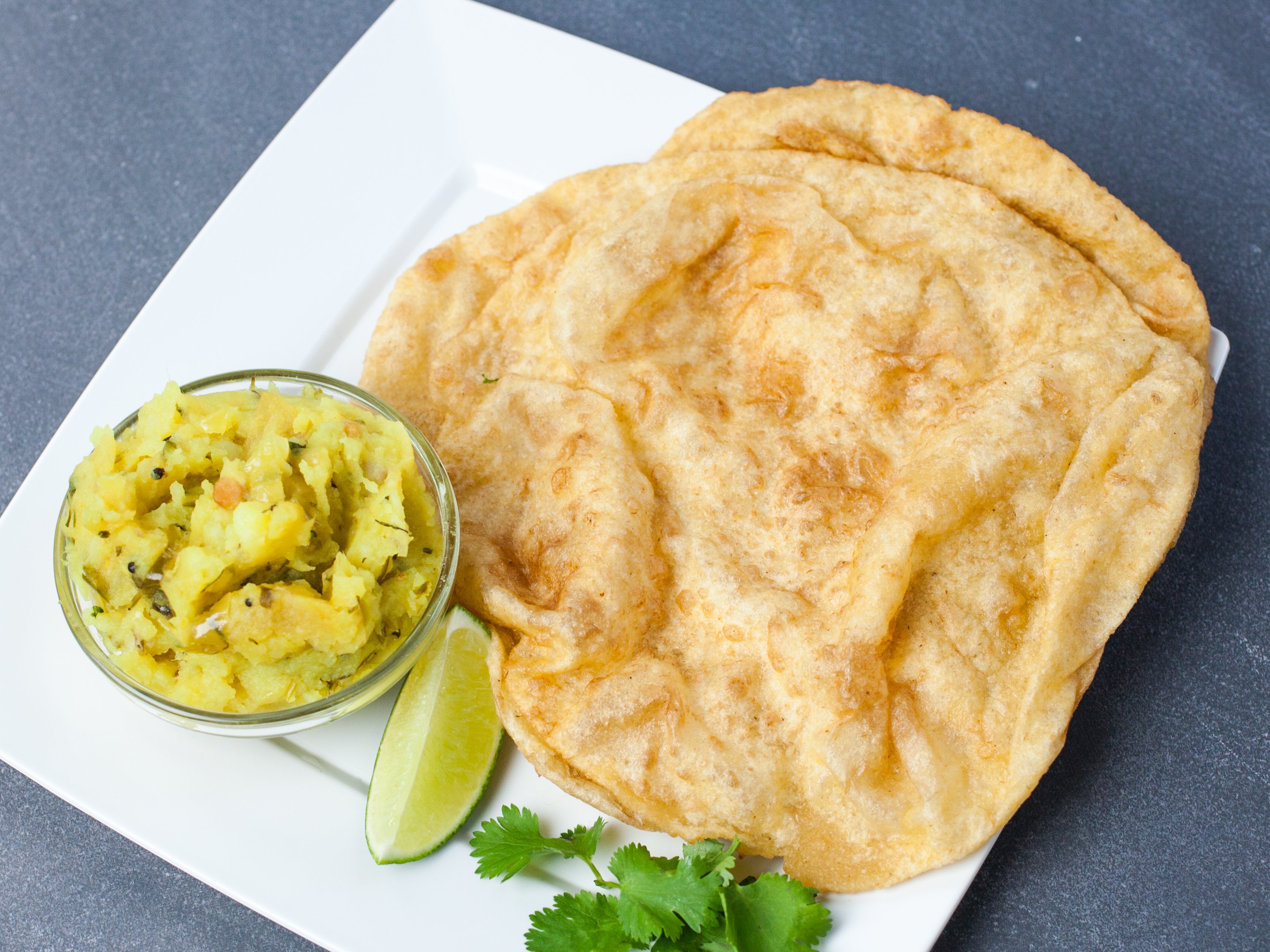 Order Poori Bhaji food online from Ganeh Dosa House store, Jersey City on bringmethat.com