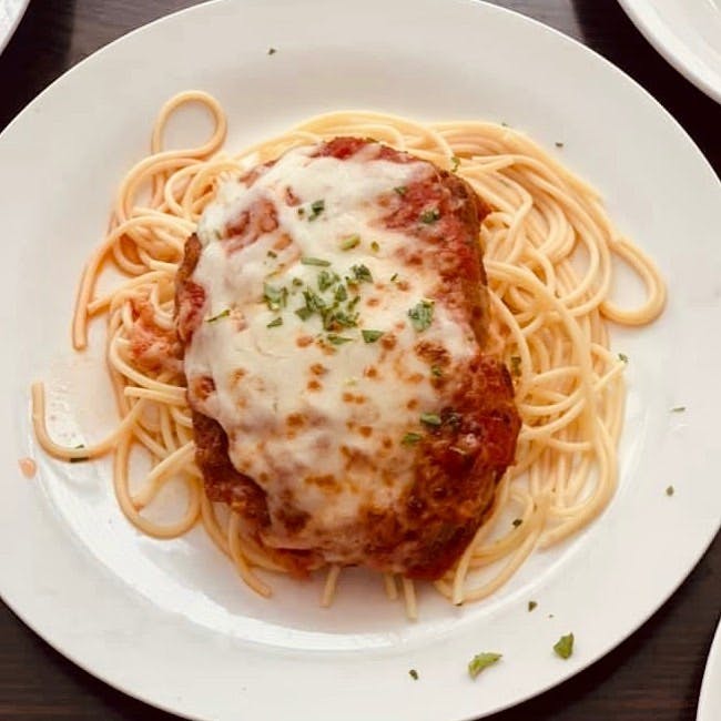 Order Chicken Parmigiana - Entrees food online from Mamma Mia! Cafe & Pizzeria store, New Windsor on bringmethat.com