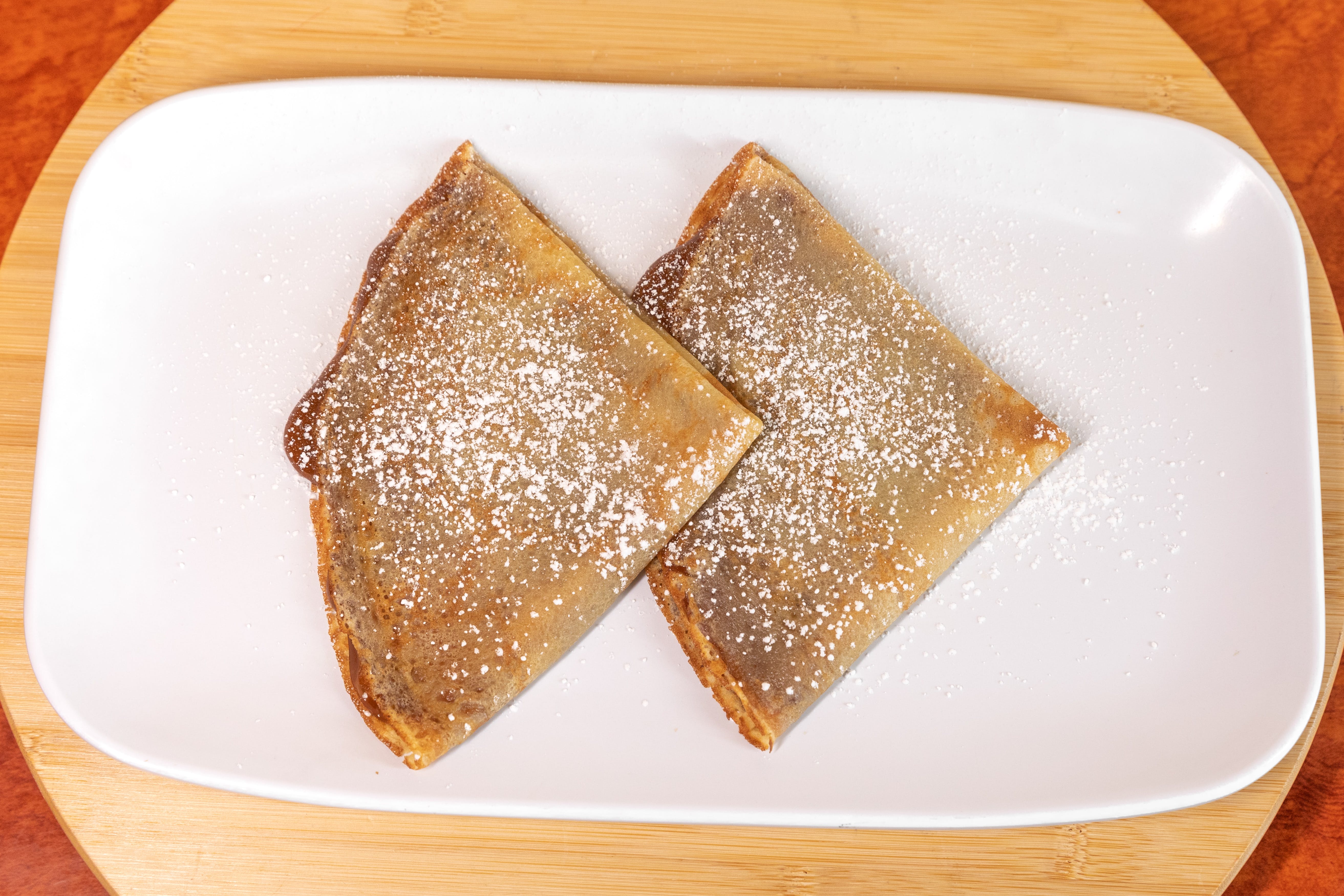 Order Homemade Crepes - Dessert food online from Empanada Man Pizzeria store, Lake Forest on bringmethat.com