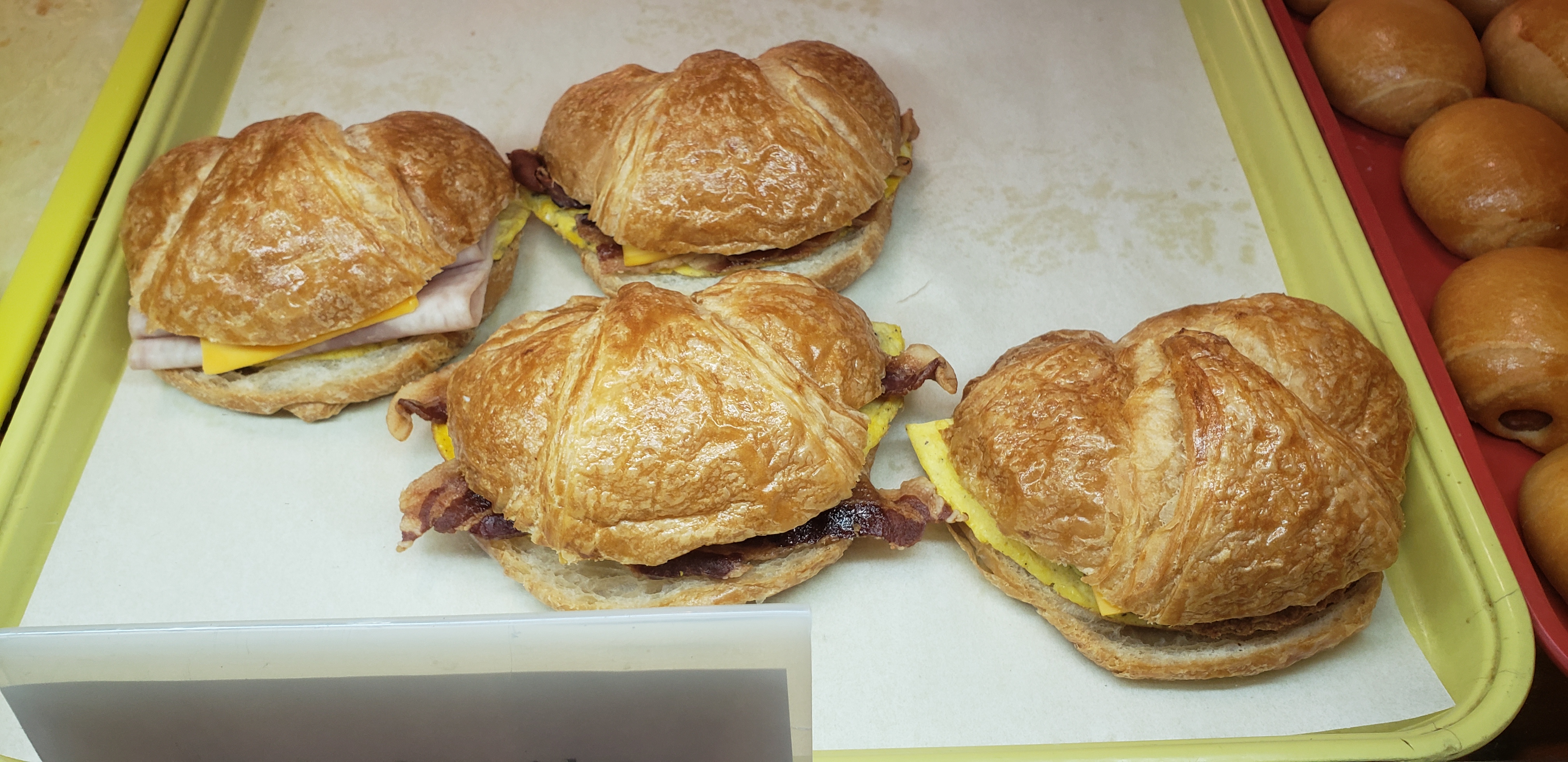 Order Bacon, Egg and Cheese Croissant Sandwich food online from H-Town Donuts store, Houston on bringmethat.com