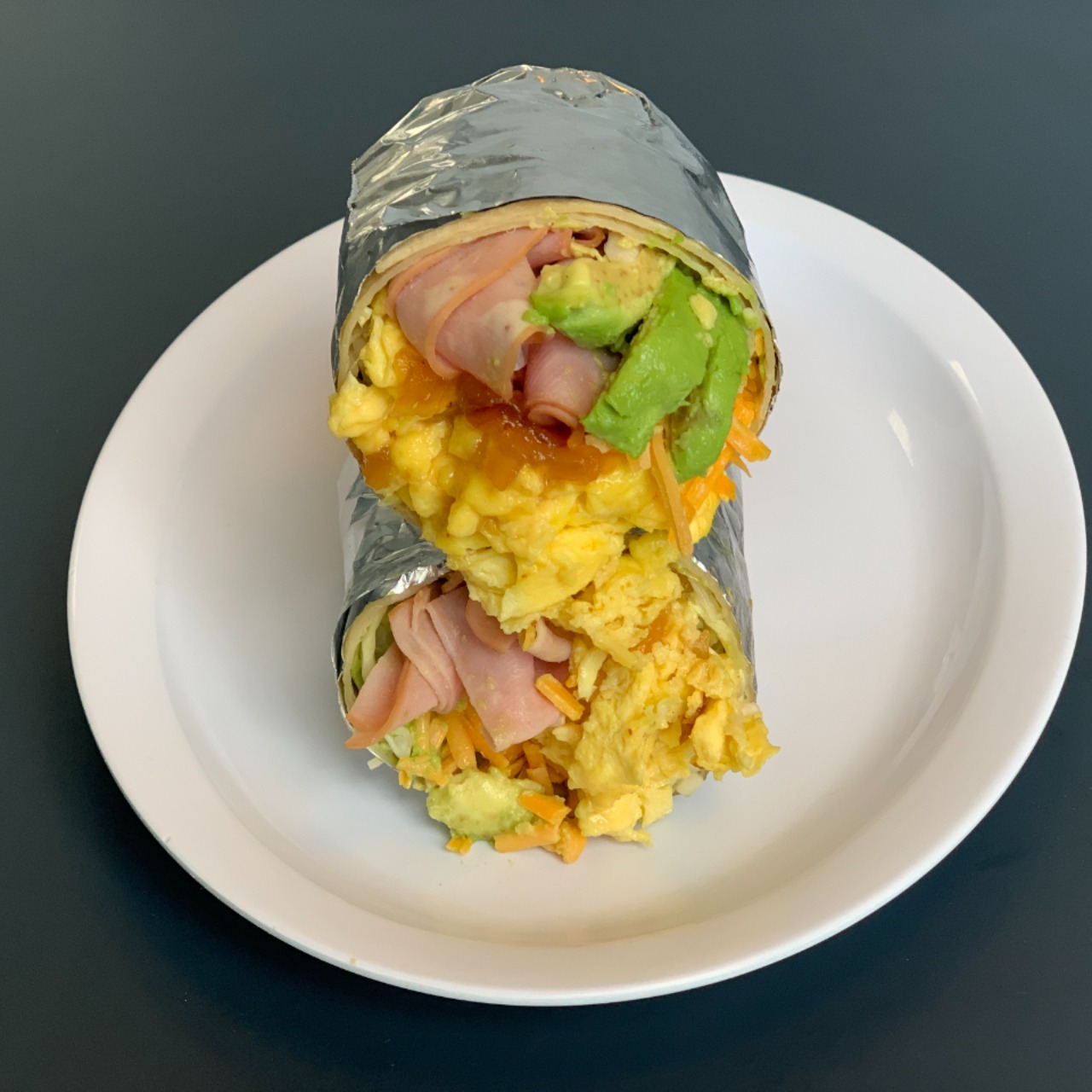 Order Ham and Cheddar Breakfast Burritos food online from Crepe Express store, Houston on bringmethat.com