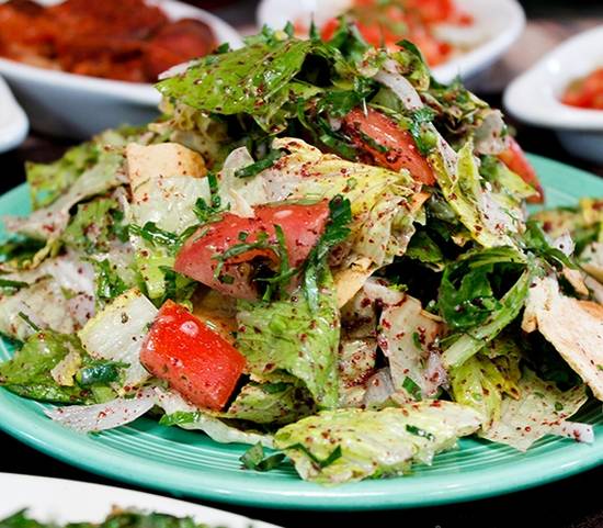Order Fattoush Salad food online from Sunnin Lebanese Cafe store, Los Angeles on bringmethat.com