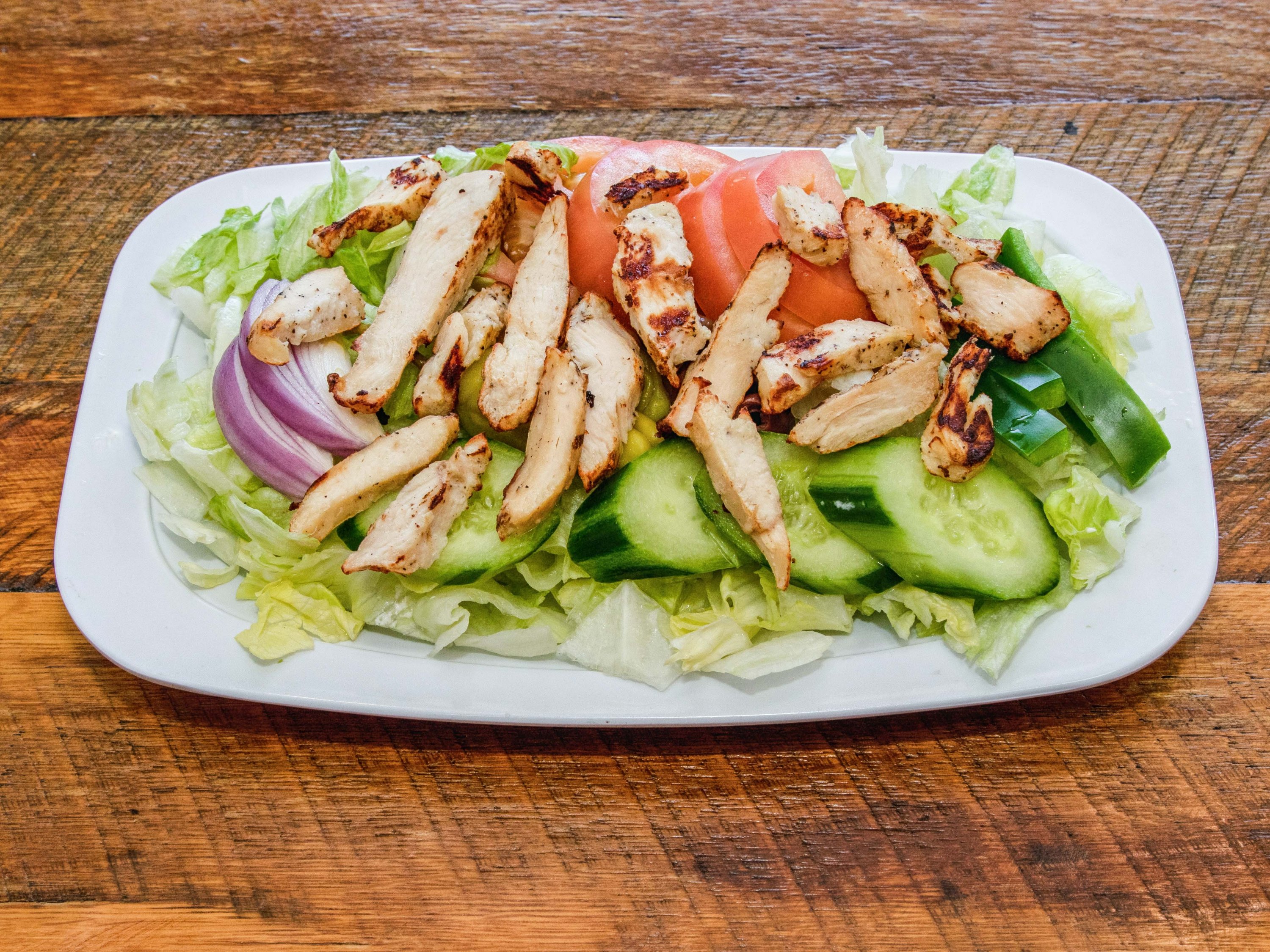 Order Grilled Chicken Salad food online from Duccinis Pizza store, Falls Church on bringmethat.com