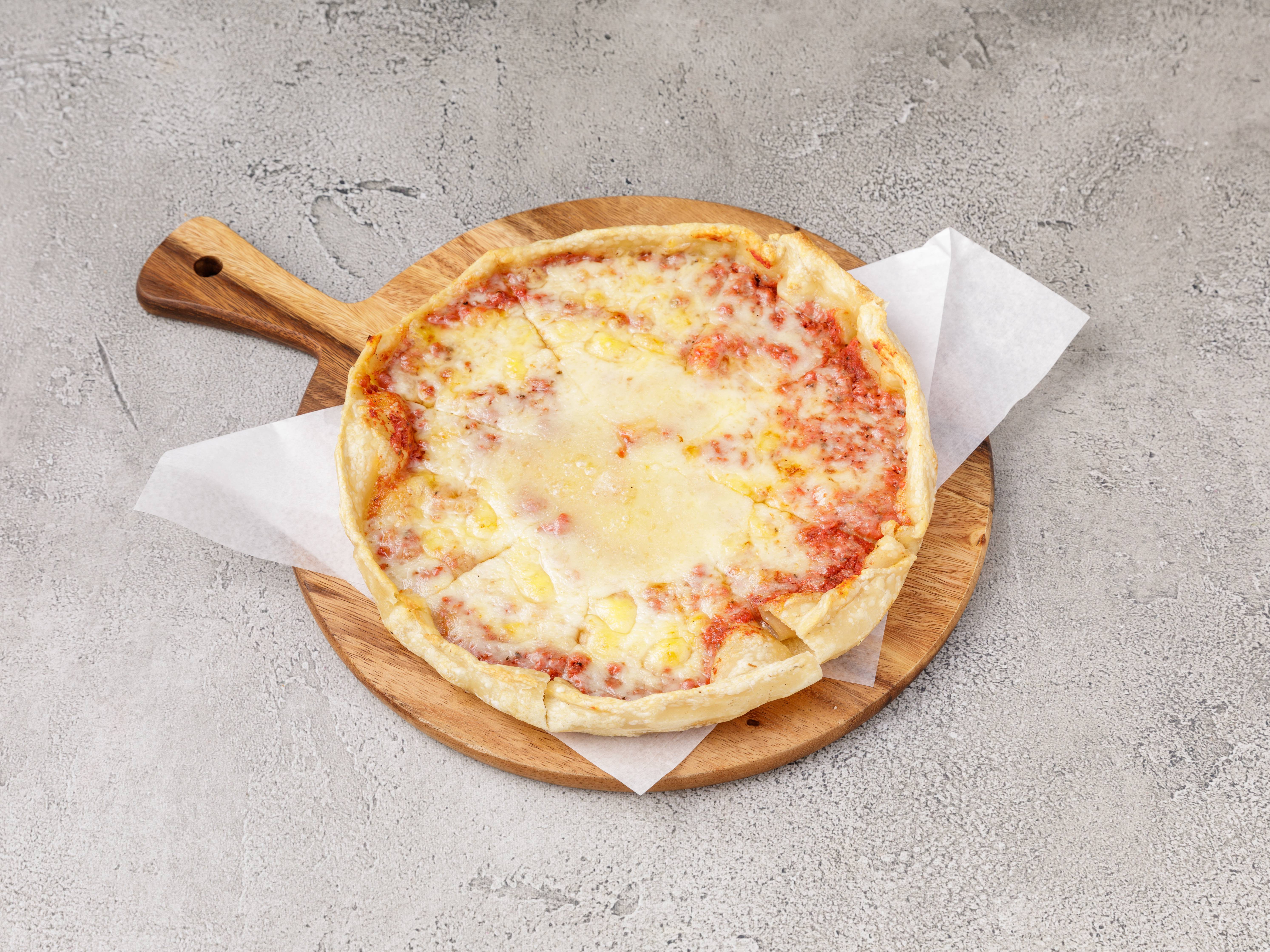Order Cheese Pizza food online from Colossus Pizza store, Tucker on bringmethat.com