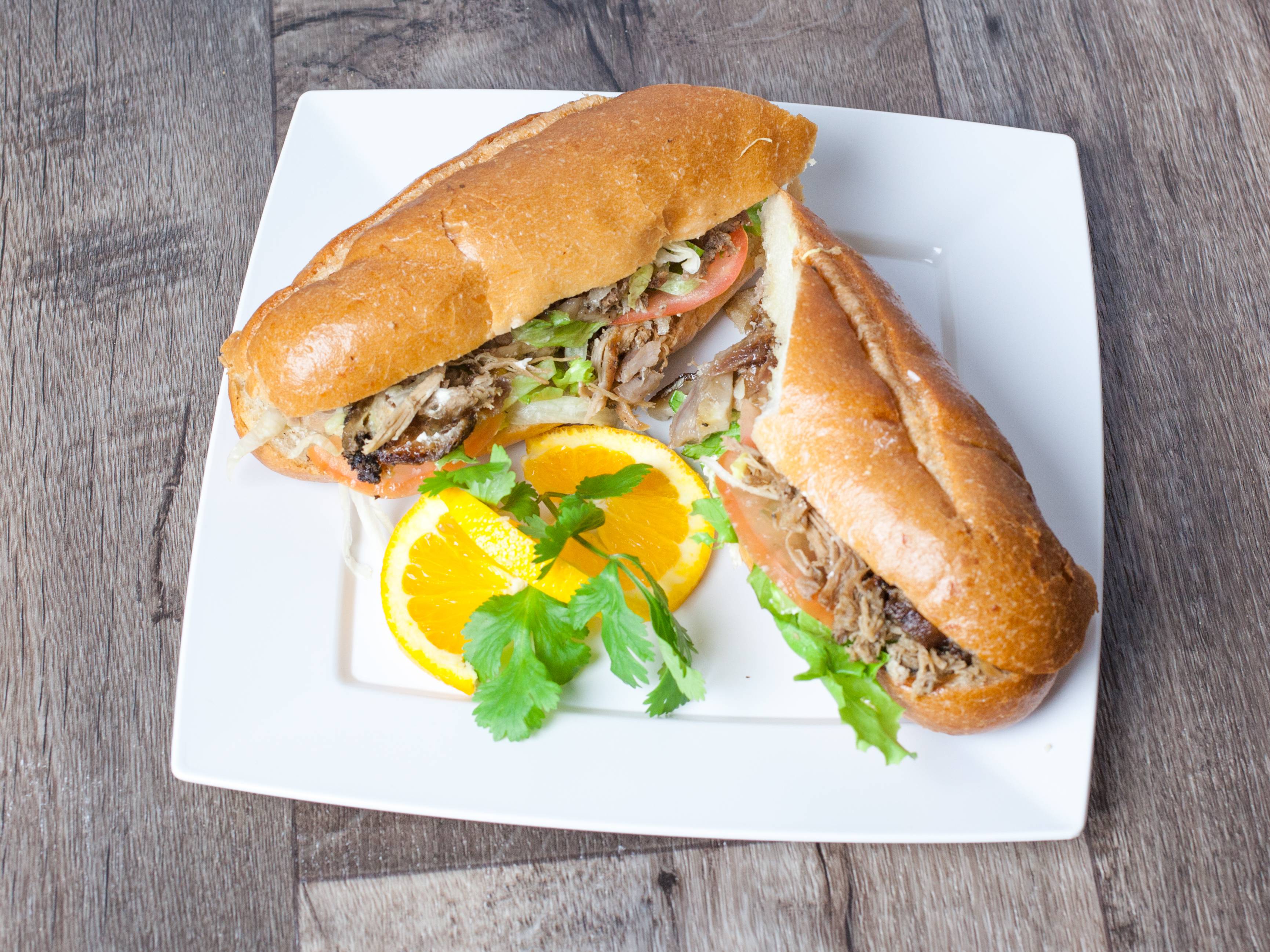 Order Pernil Sandwich on a Hero food online from El Tipico Restaurant store, Brooklyn on bringmethat.com