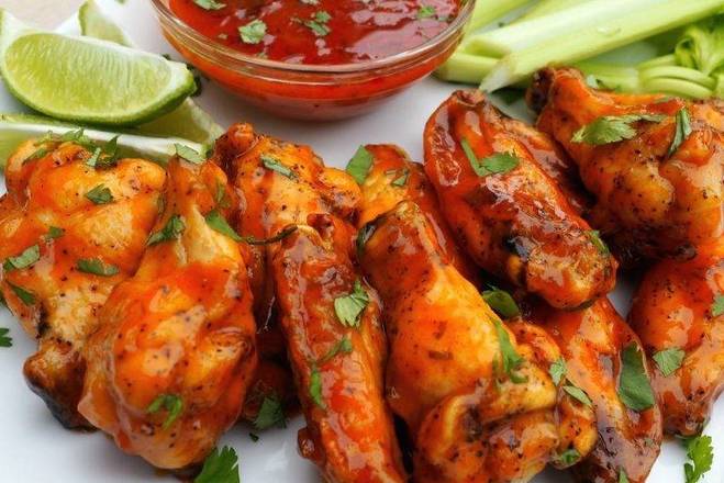 Order Spicy chicken wings (6pcs) food online from Thrive Kitchen store, Atlanta on bringmethat.com