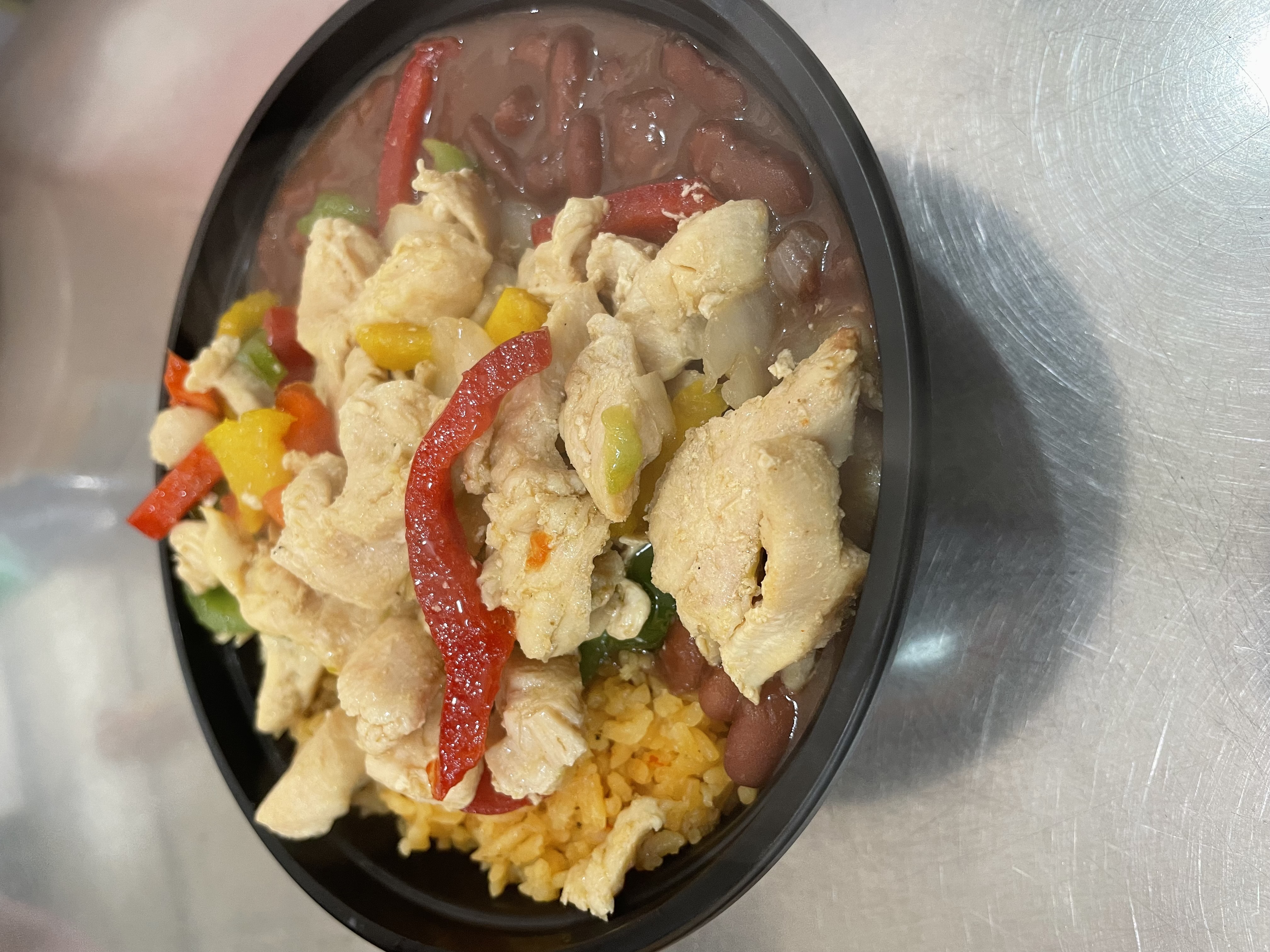 Order SAUTEED CHICKEN WITH ONIONS & PEPPERS food online from Rice N Beans To Go store, Bethlehem on bringmethat.com