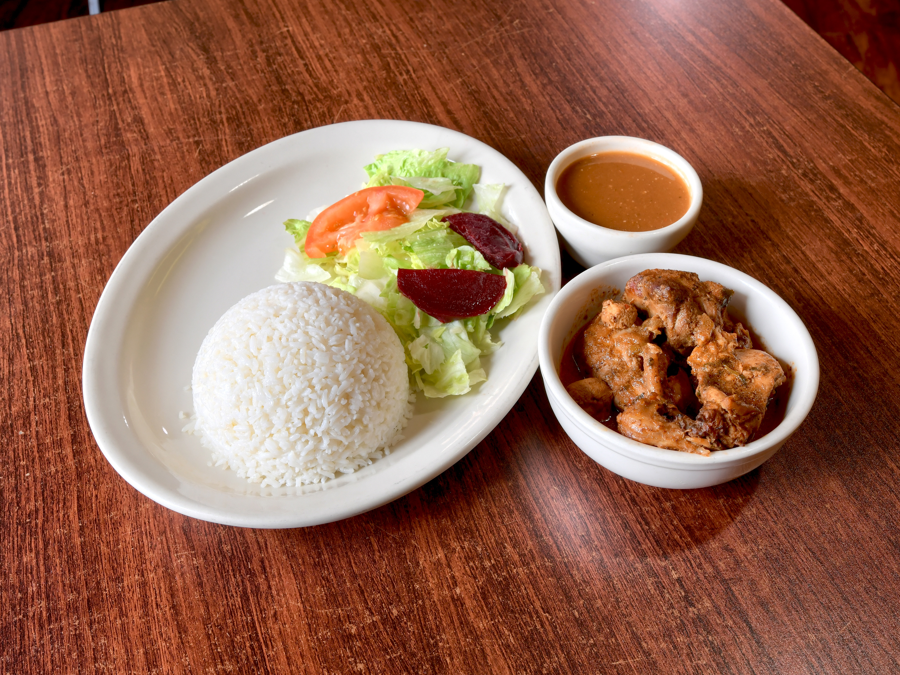 Order Pollo Guisado  food online from Tropical Point Restaurant store, Nashua on bringmethat.com